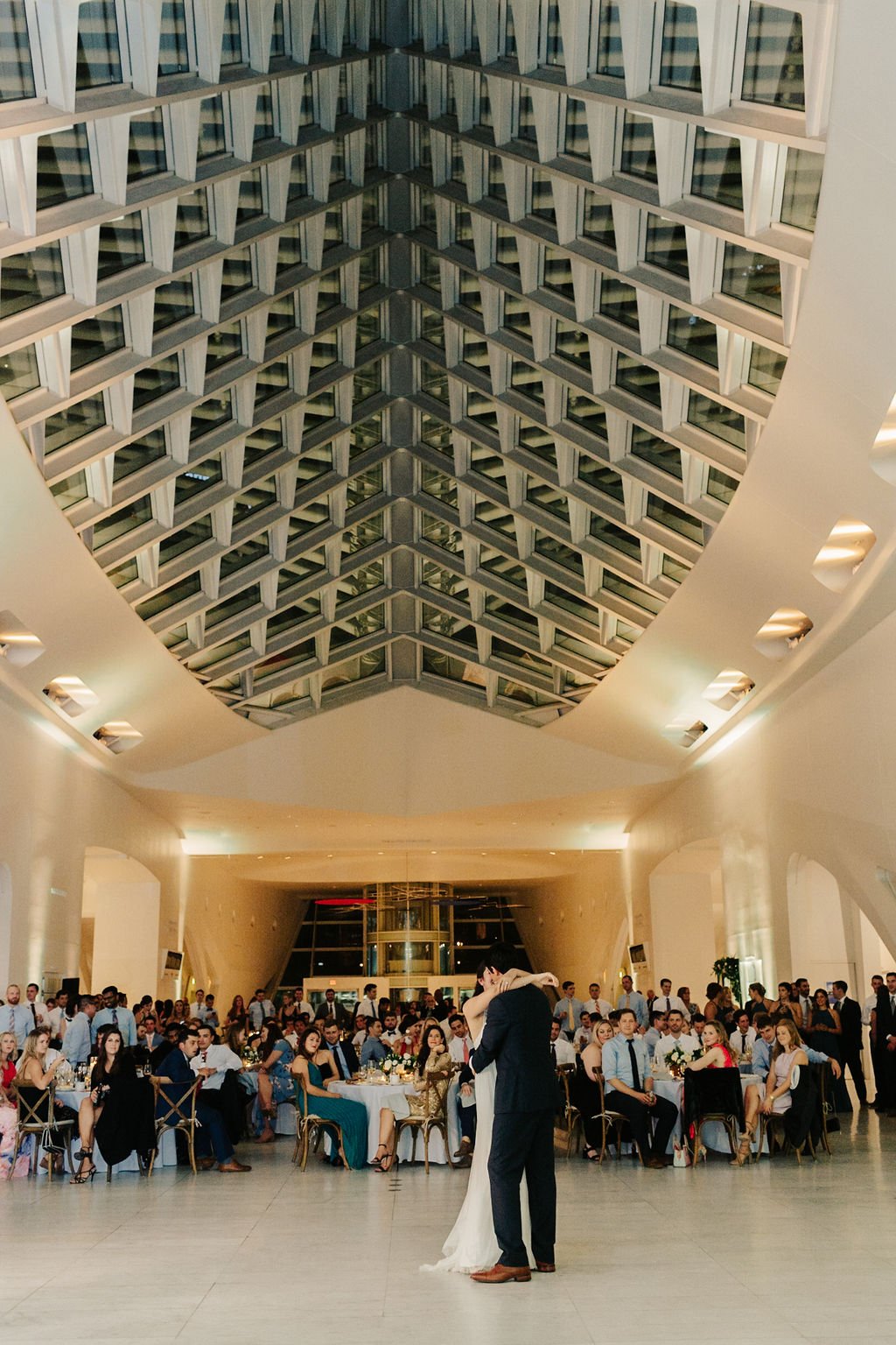 Bride and groom first dance at the Milwaukee art museum