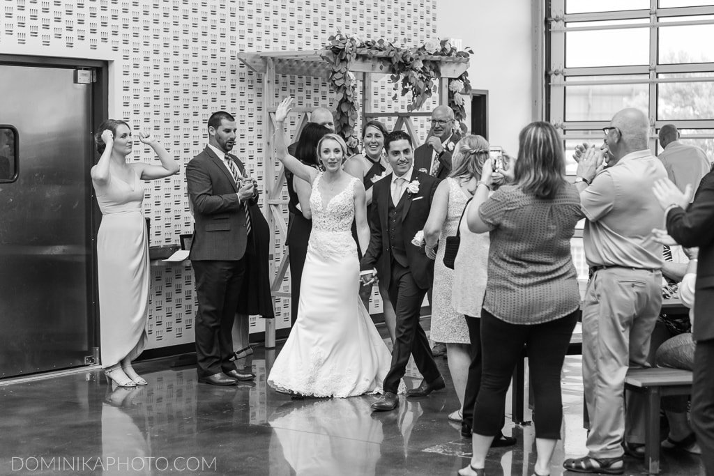 Bride and Groom reception entrance to their Milwaukee Brewing Company wedding