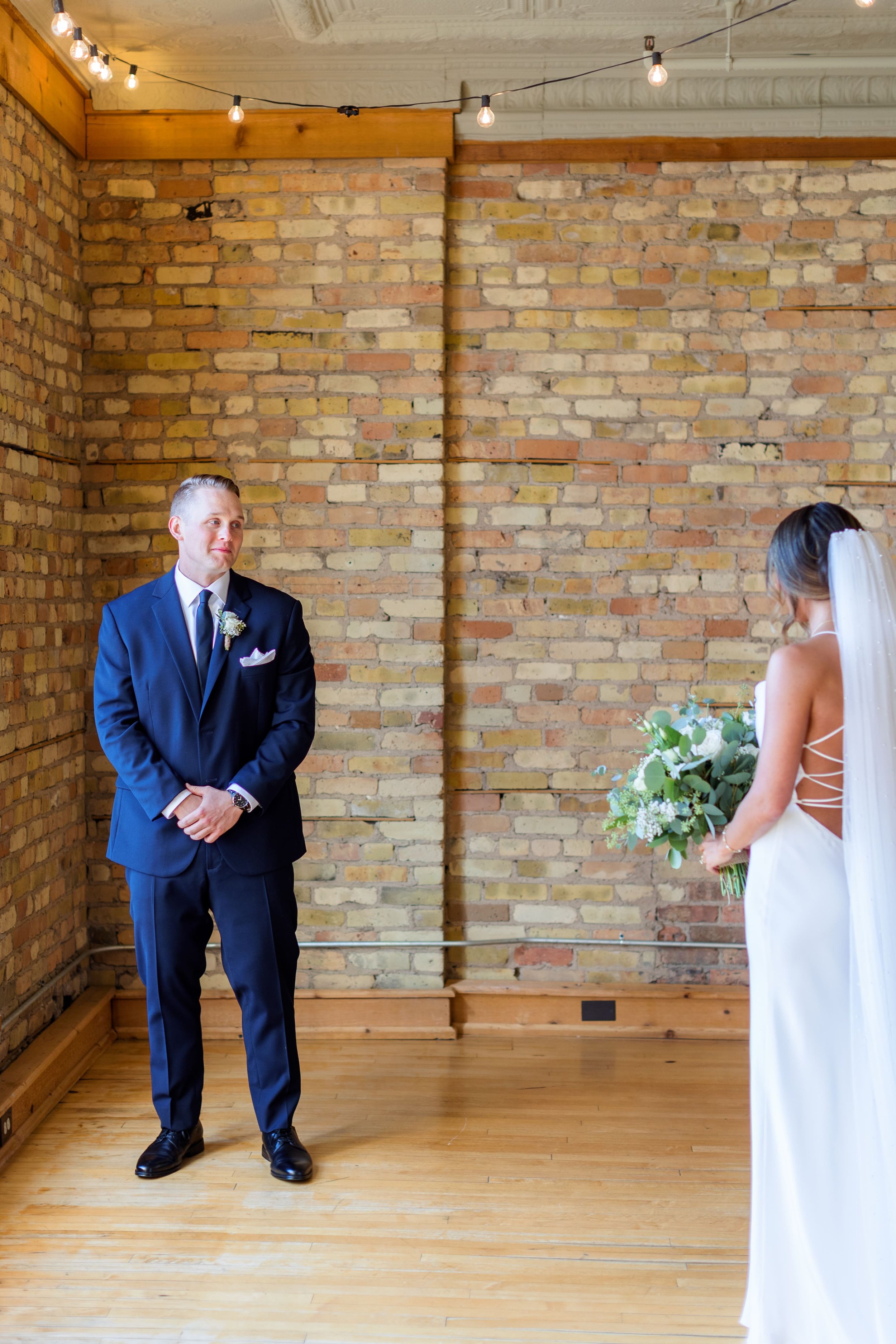 First Look with bride and groom at Highland loft wedding venue