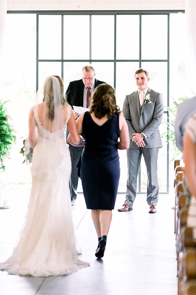 Bride walks down the aisle at her Chestnut Ridge wedding NC