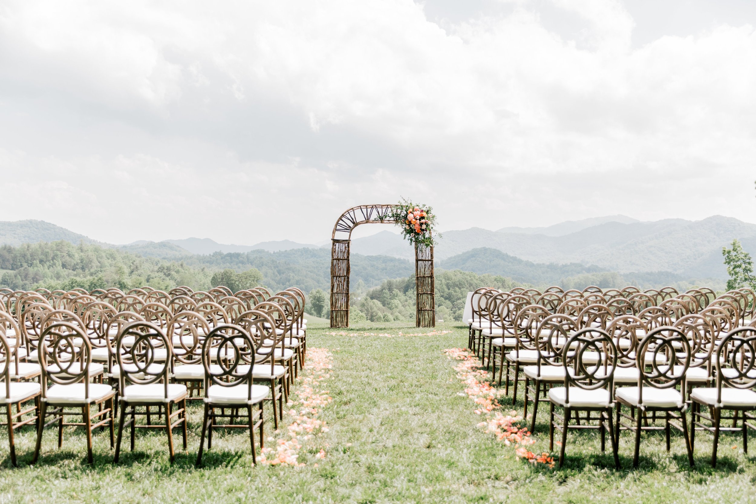 Outdoor Wedding Ceremony overlooking the mountains at The Ridge Wedding Venue