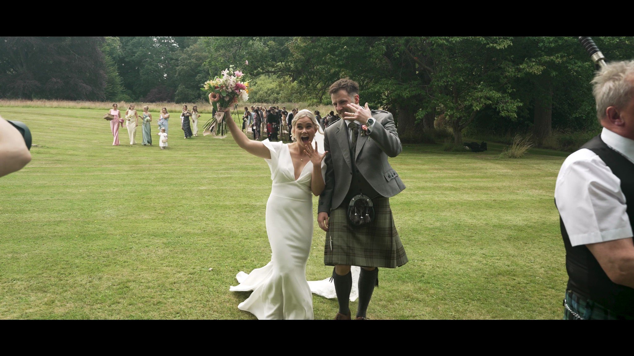 Rowan and Rhys celebrating together on the lawn