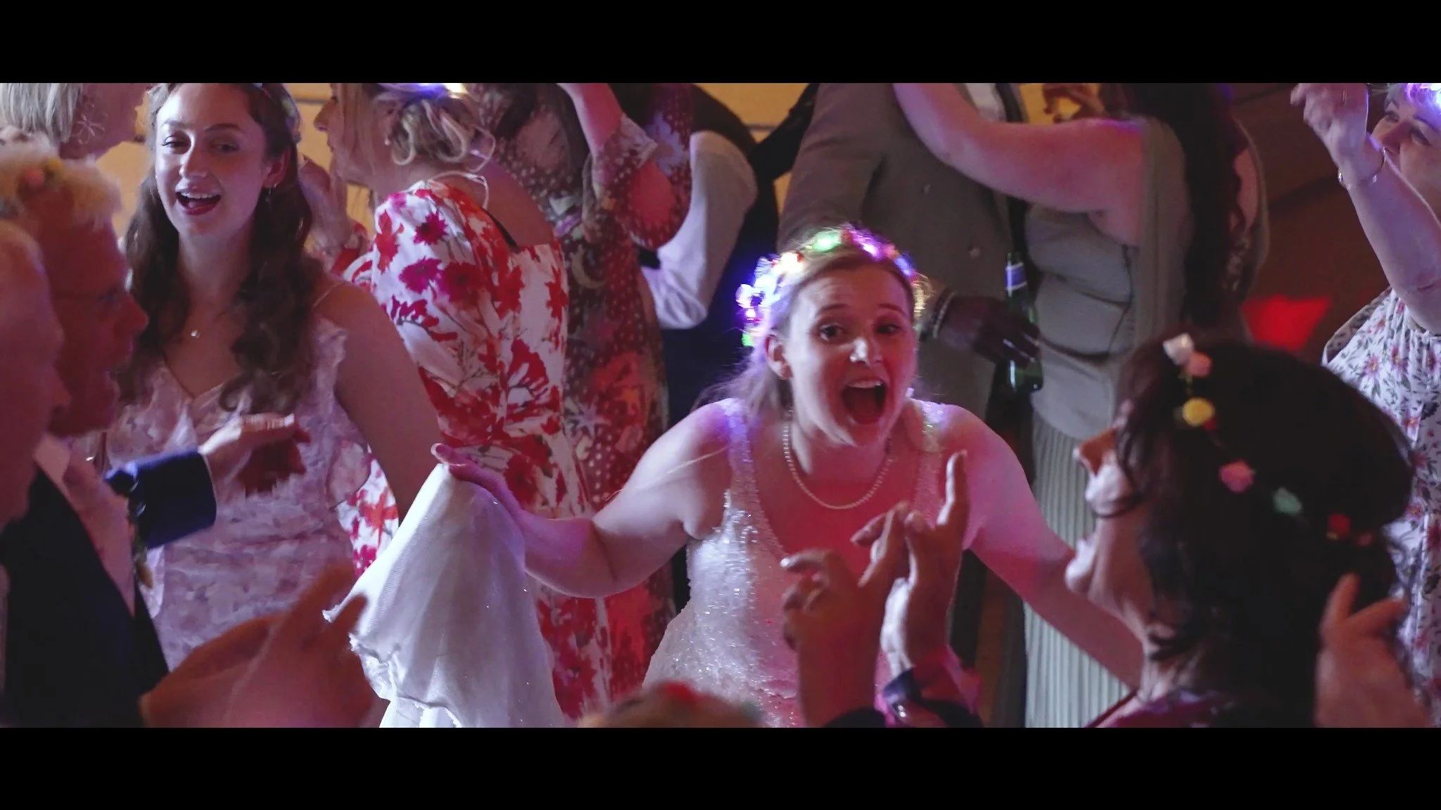 Hannah dancing with guests inside the tipi at John Muir Tipis