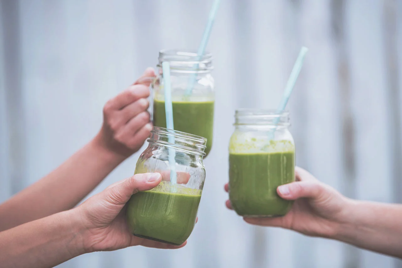 People Holding Smoothies.jpg