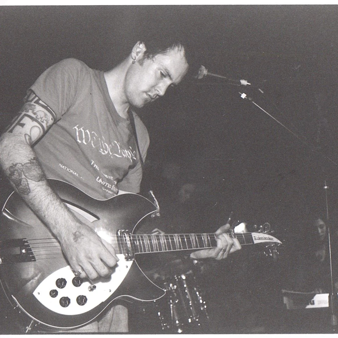 Back in the previous century, long before bankers and sorority sisters began getting tattoos, we punk rockers did. And one of the first on my arm, were those black lines above the elbow, which I took from an early Jawbreaker 7". I told you that 