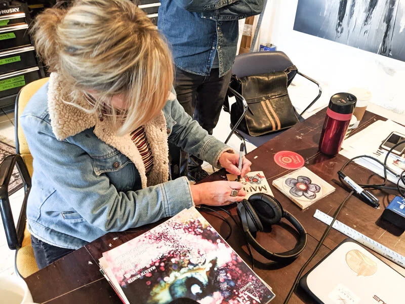 molly-mayer-signing-album-legacy-matters-podcast.jpg