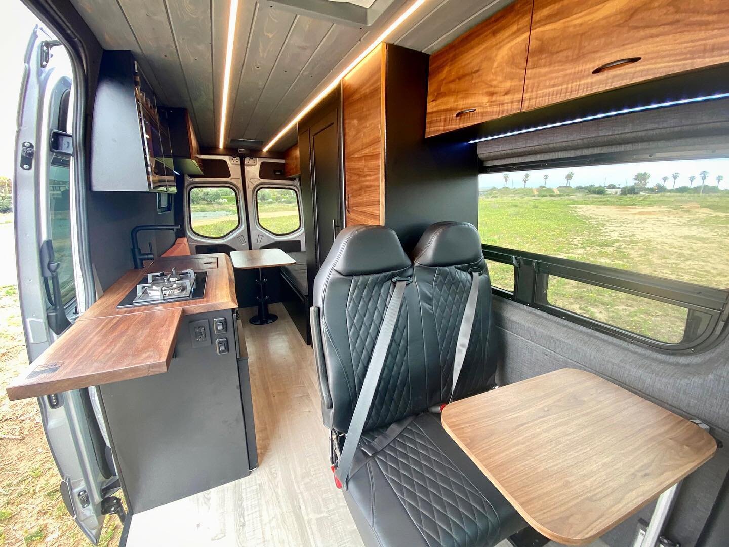 Designed with friends and family in mind, this van seats plenty and has its own cocktail bar to boot!