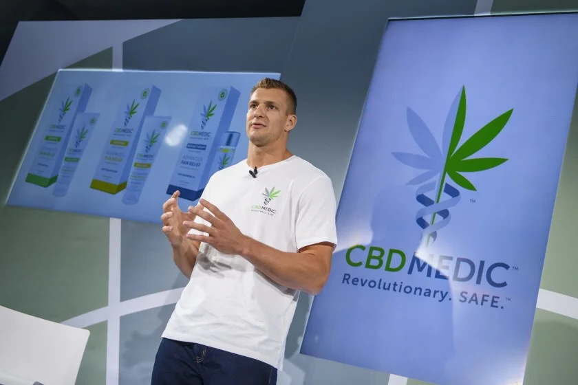 Former New England Patriots tight end Rob Gronkowski holds a news conference in August announcing his advocacy for cannabidol (CBD) and his decision to partner with a company selling CBD products. (Associated Press)