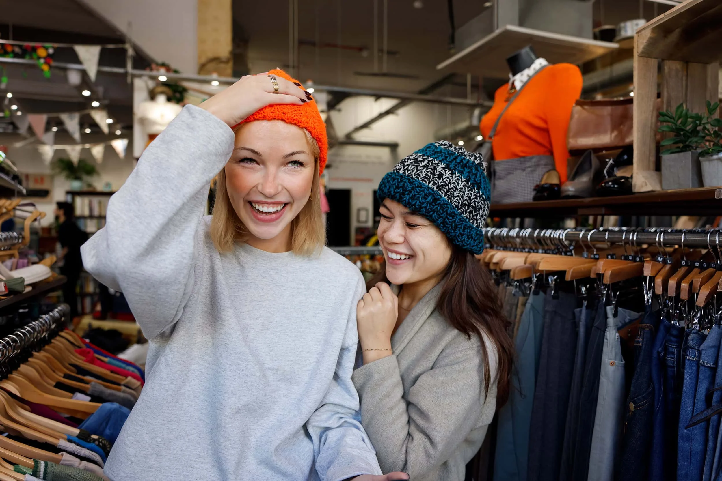 charity shop fashion | nick david | london photographer | lifestyle photographer

Two female friends trying on hats - vintage charity clothes shop