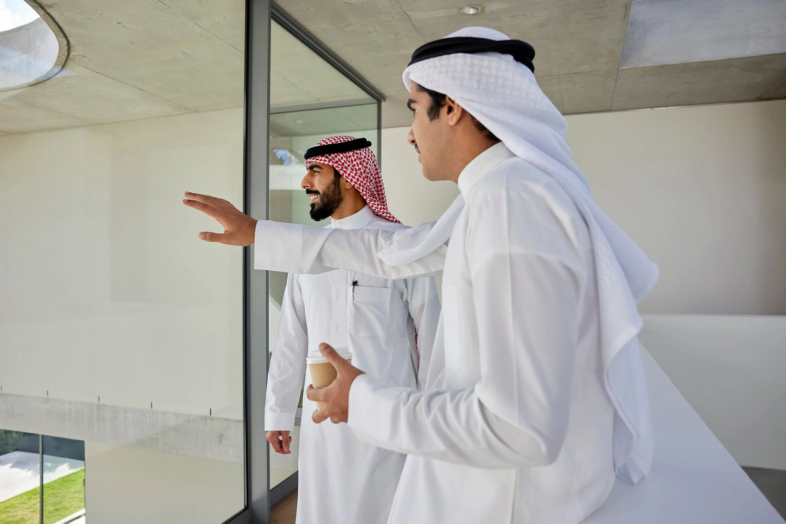 Business Meeting | Corporate Photographer | Nick David | Corporate Photography | Business meeting in modern corporate environment Middle East