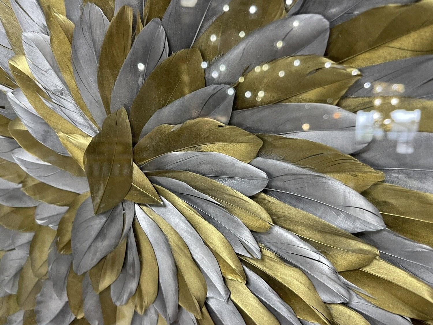 Gold Feathers Sorted by Color Displayed Beautifully Low · Creative Fabrica