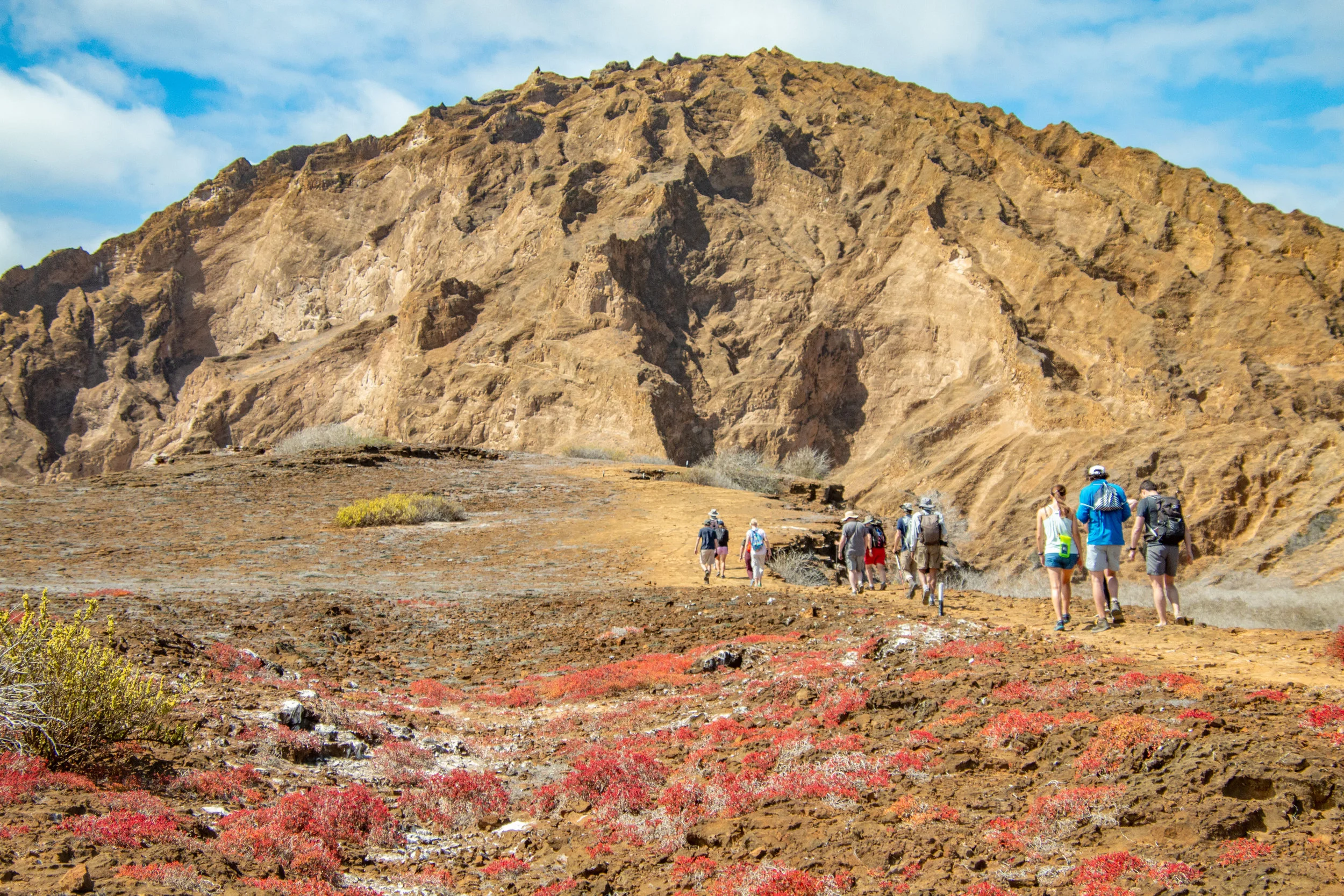 Guests hiking on a nature trail ascending Punta Pitt, San Cristobal.