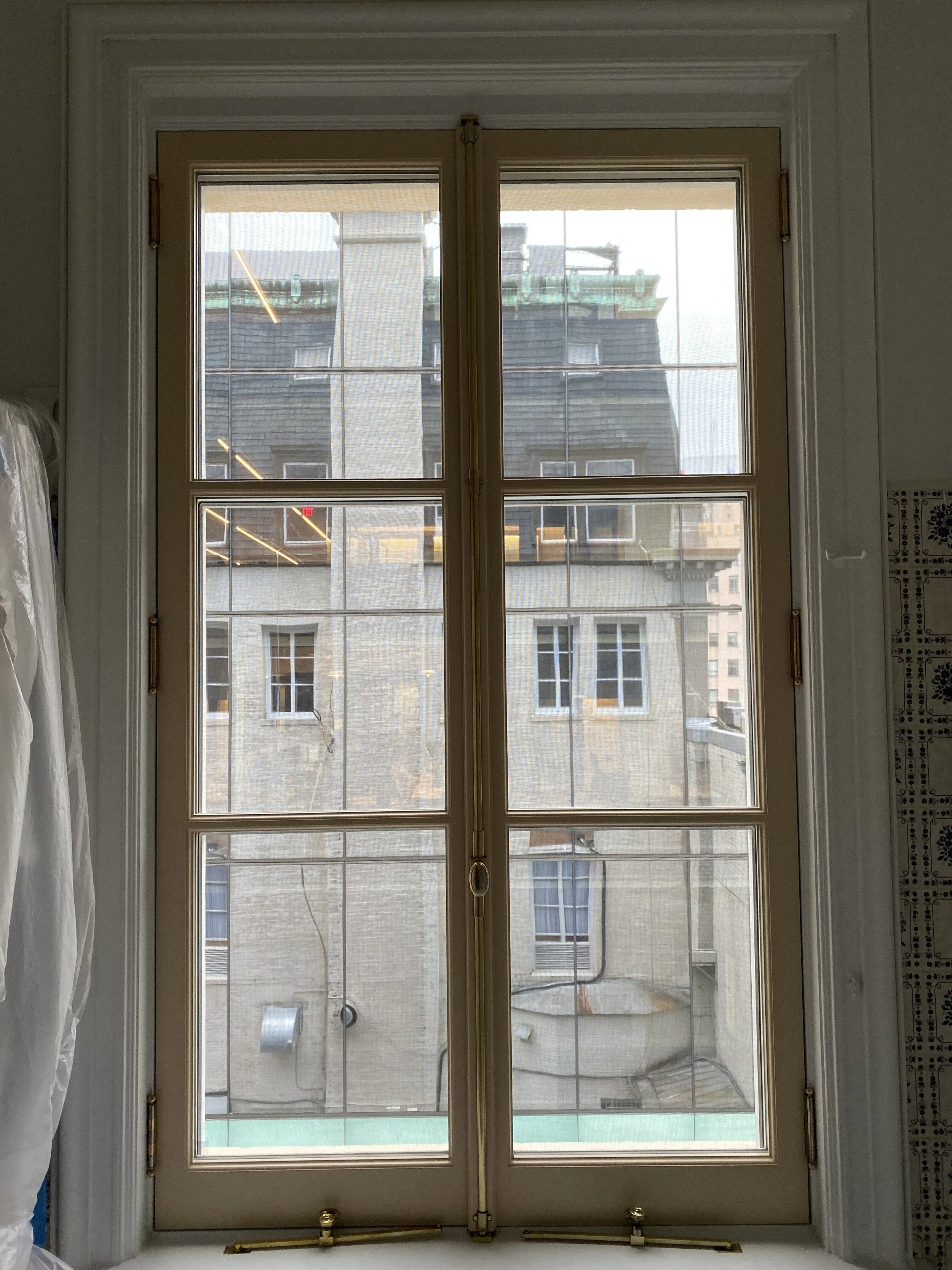 A wonderful phenomenon was apart of this building at its east elevation. A completely reflective modern structure returns back a view of the Russian residence. Windows at the center of this image are those that we reproduced.
