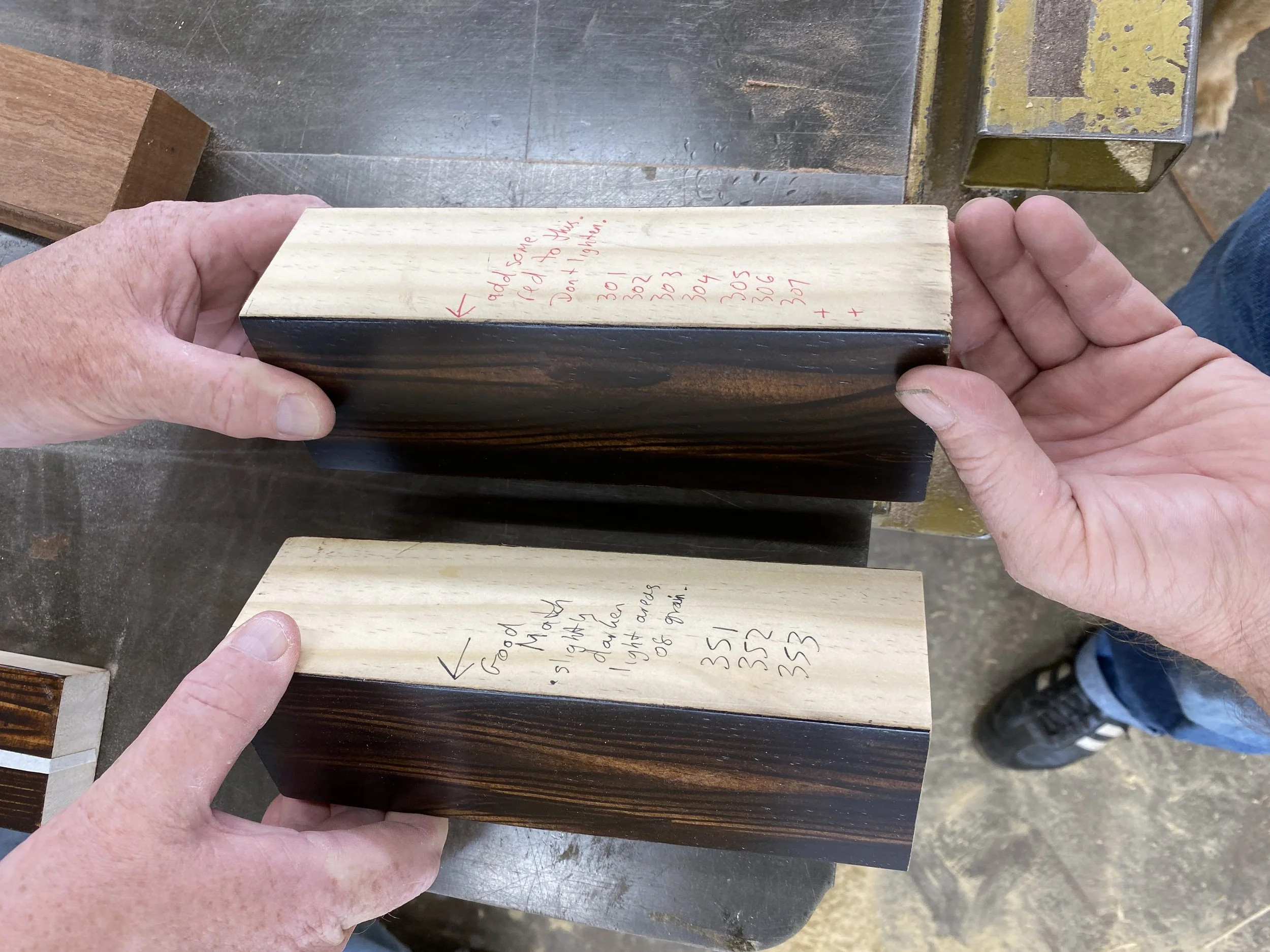 These are stain mockups for the Lewis Powell Courthouse. We were able to control undertones and successfully match the existing courtroom finishes.