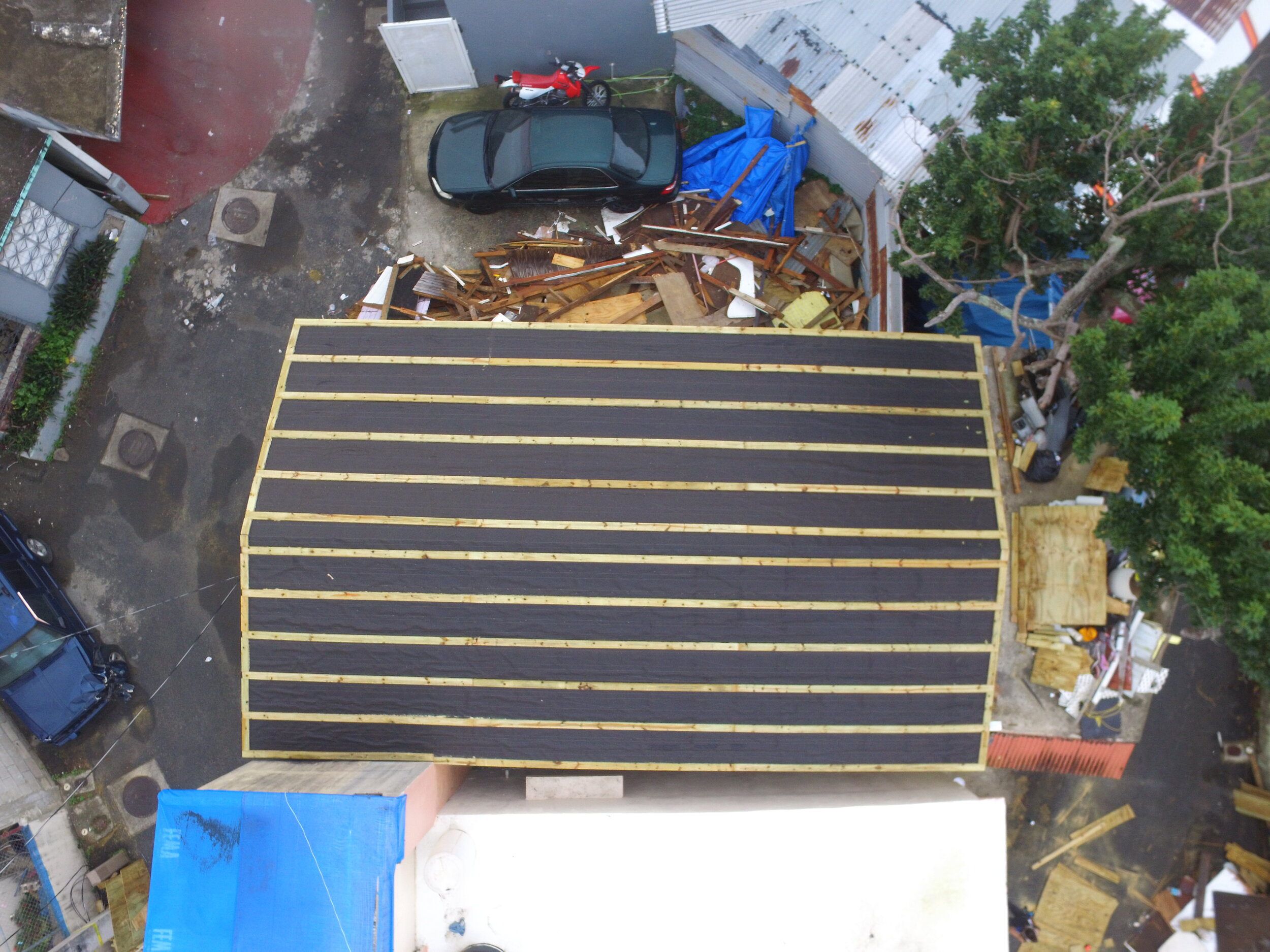 Drone view of the second house after the furring was secured on top of the insulation felt. Photo by Luisel Zayas. 