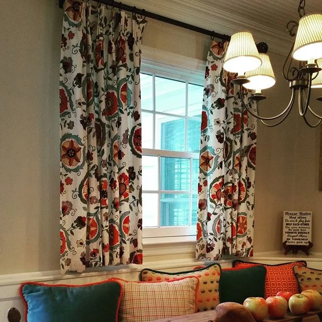 Color makes life happy!!! Custom pinch pleated draperies with coordinating pillo.jpg