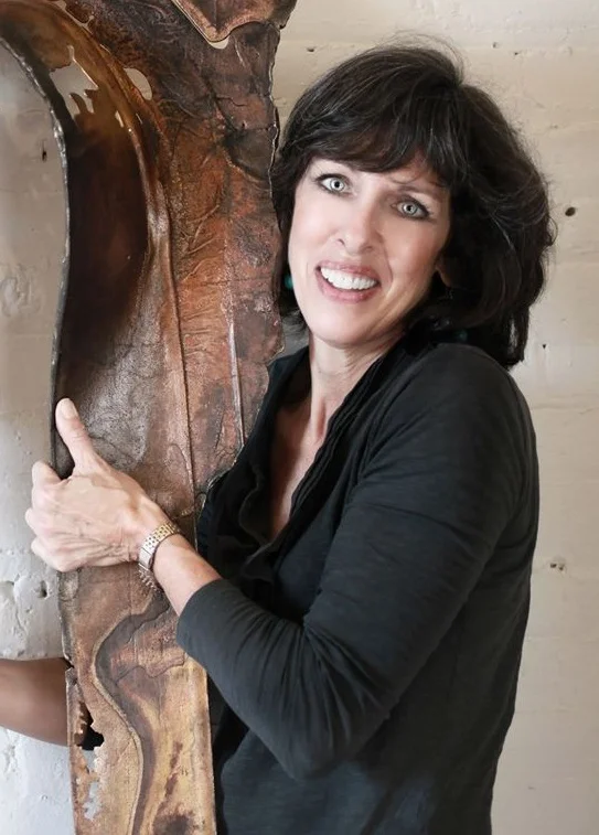 Deborah Alexander with The Bronze Stole, bronze cast from a sand mold.