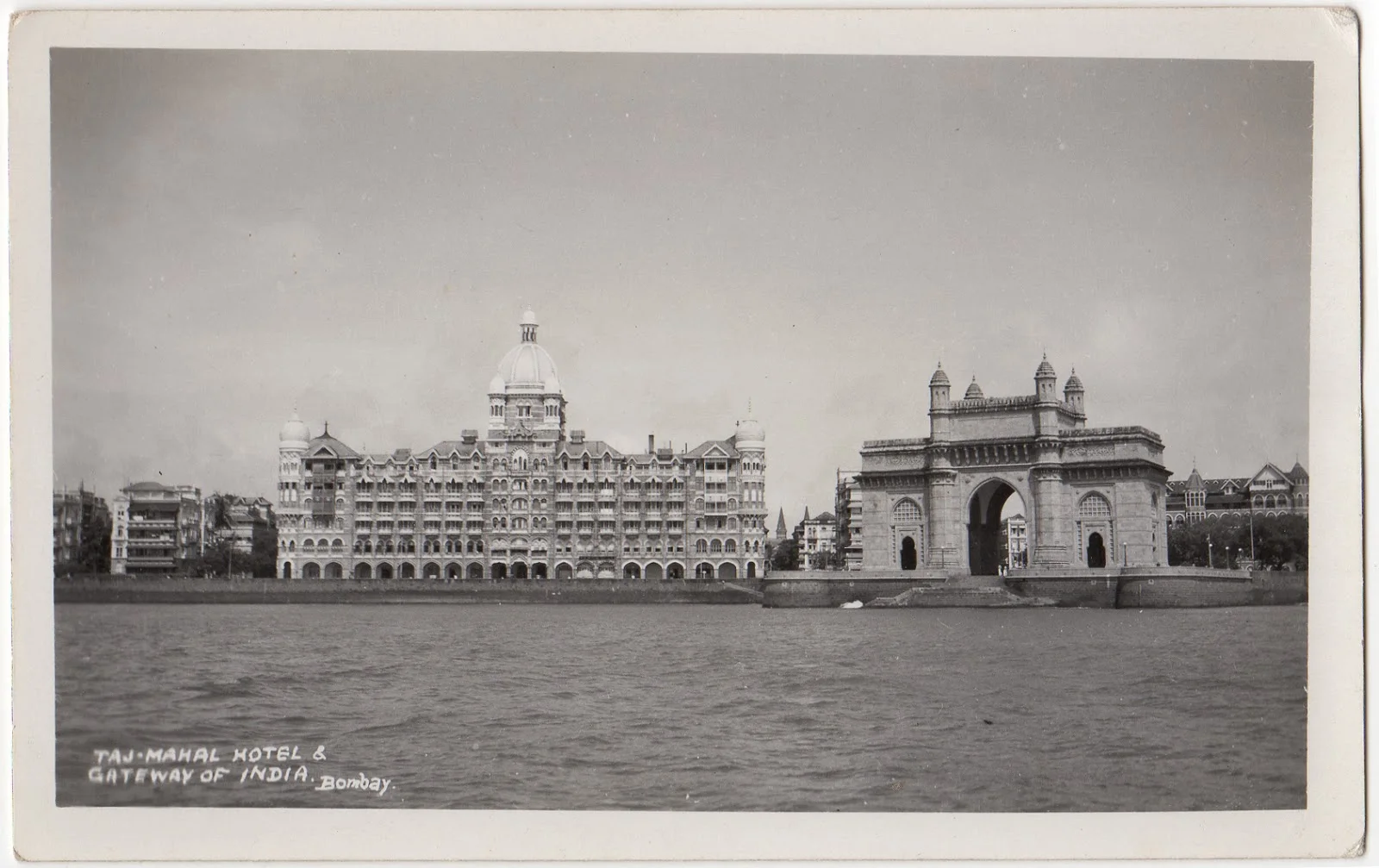 The Gateway of India in the foreground, Green's behind, the Taj Mahal to the left of the image and the Yacht Club to the right