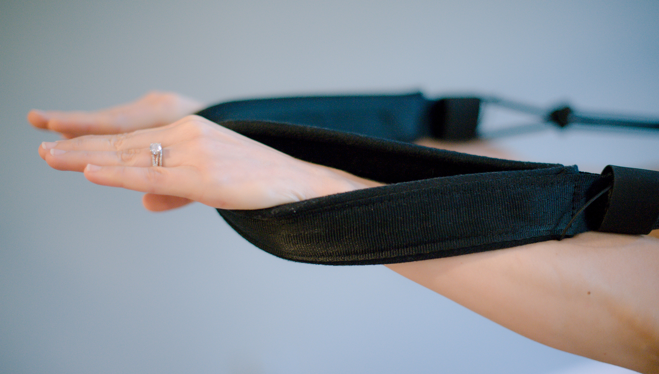 TheBreathingRoom-Pilates-Studio-Houston-Hands-In-Straps.jpg