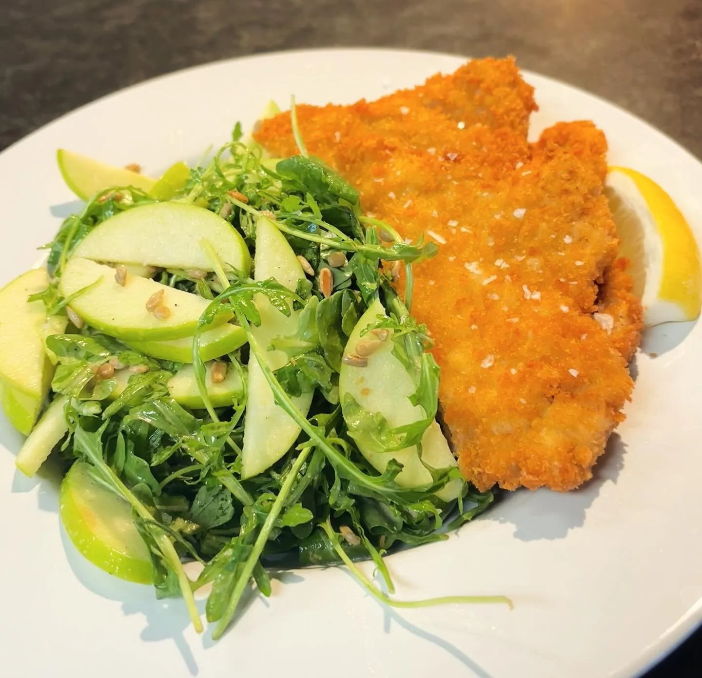 New special alert 🚨 

Crispy pork Milanese paired with a bright arugula, apple &amp; sunflower seed salad&mdash;finished with a zesty lemon vinaigrette🌿🍋
#nianticmainstreet #nianticboardwalk #fresh #apizza 
visit us @ 294 Main st. niantic 
order n
