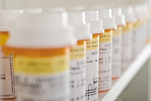 Image of medications, which may not be as effective long term as chiropractic treatment.