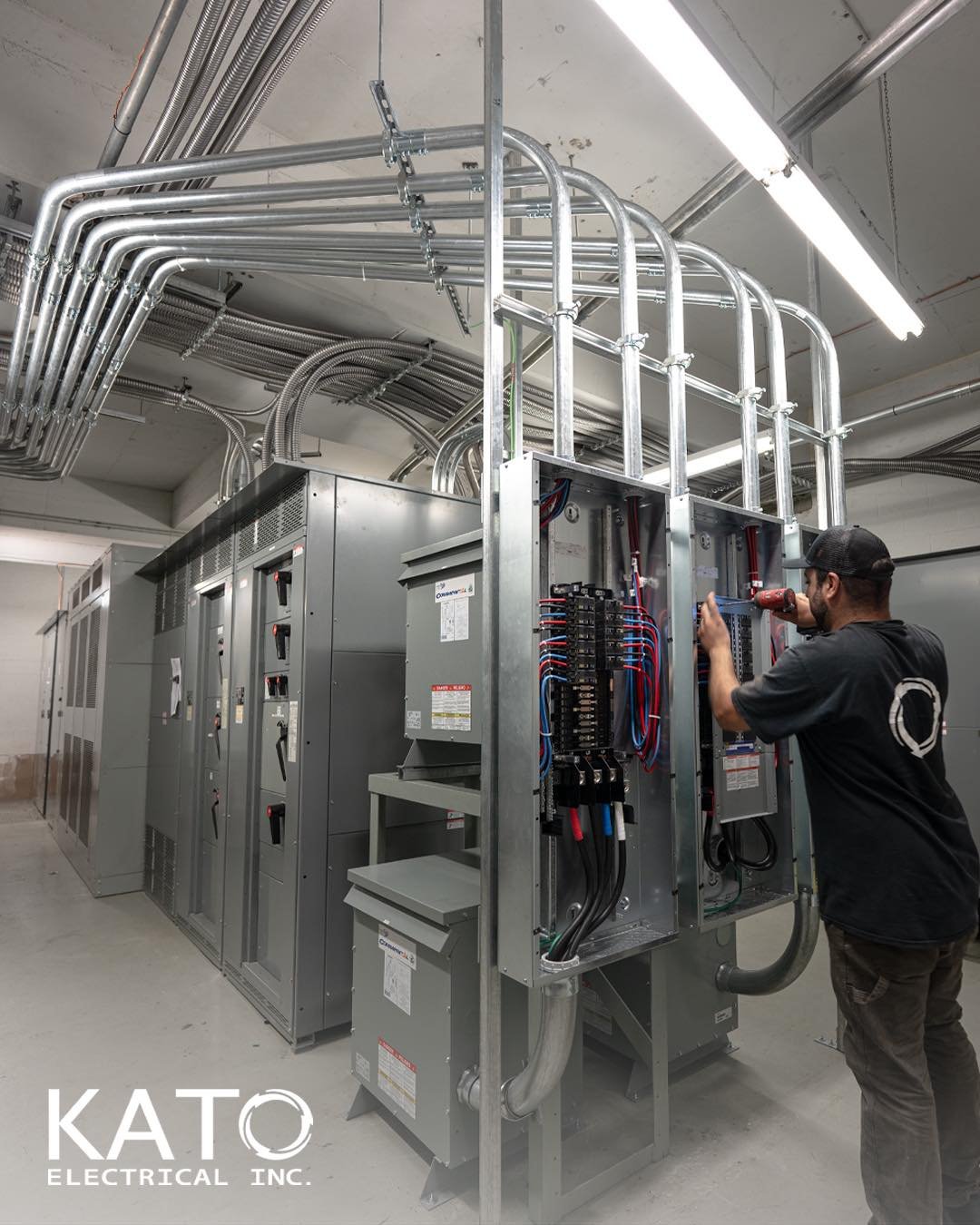 ⚡Gerardo in action, buttoning up this project! featuring EV charging upgrades and some disproportions. 

We installed 3 panels &amp; 3 transformers, turning a tricky setup into a clean, functional solution! 🫡

#KatoElectrical #EVCharging #PowerDoneR