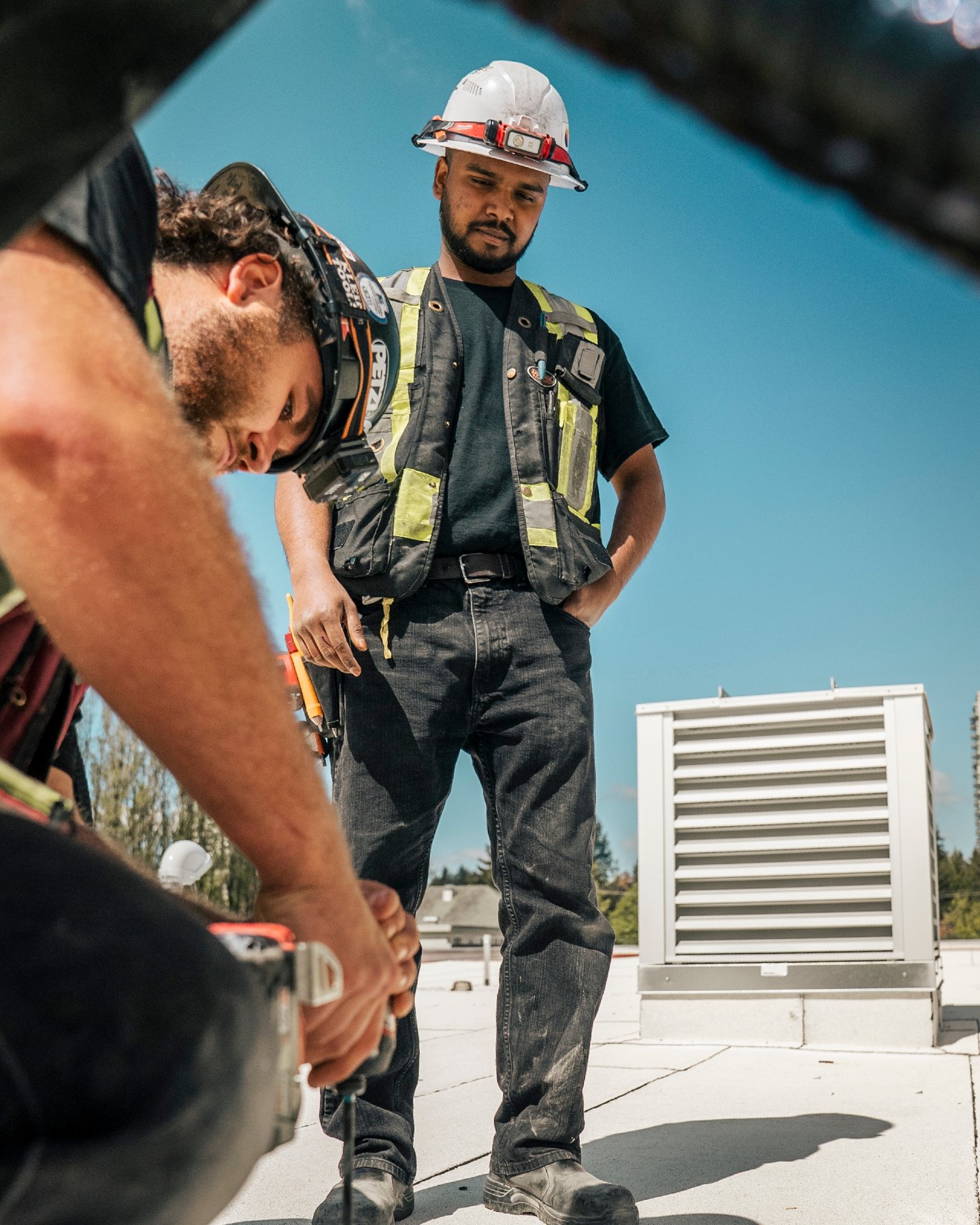 Two sets of eyes, one standard. 👀
Rooftop work in the sun this week &mdash; one running the drill, one making sure it's done right. That's how the job gets done properly: experience backing up every install.
Licensed &amp; insured electrical across 