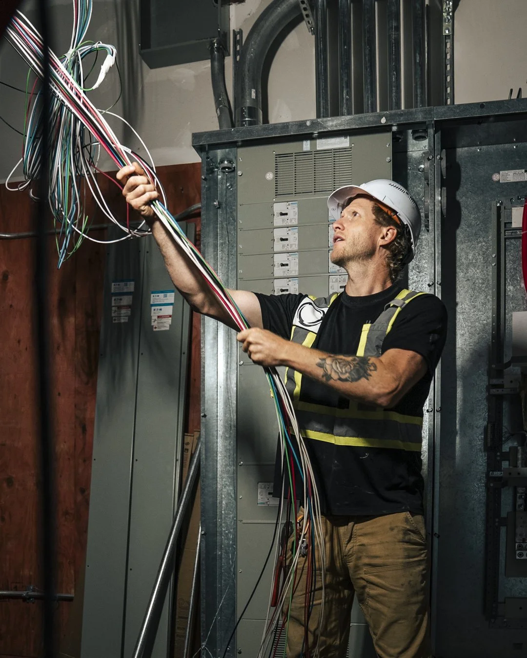 Somewhere in that bundle is every circuit in the building. 🔌

Ryan pulling control wiring into the main electrical room &mdash; hundreds of conductors that all have to land in exactly the right place. This is the part nobody sees once the walls clos