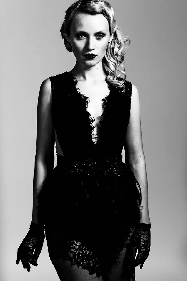 Emily is wearing dress by Cristallini , gloves by Beyond Retro
