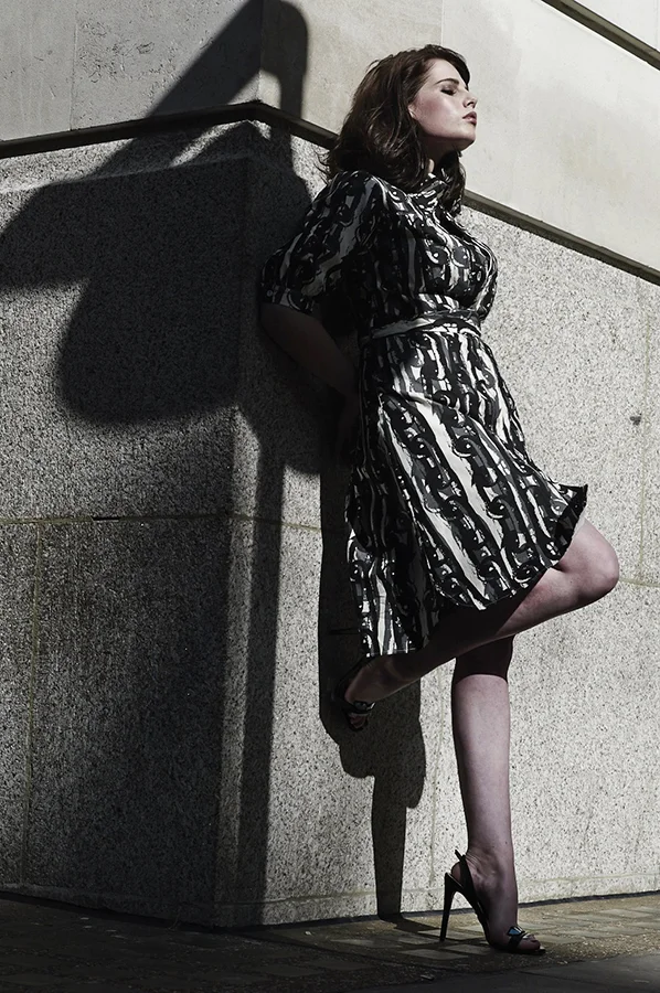 Lucy wears dress by A Child of the Jago , shoes by Chiara Ferragni