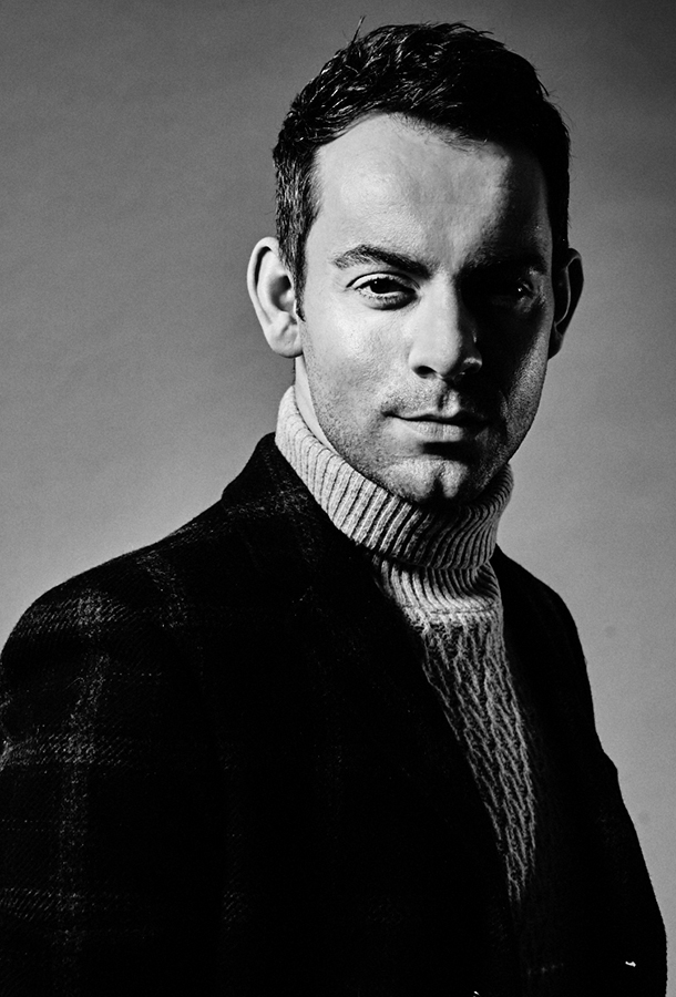 Ben wearing turtle neck and coat by Tommy Hilfiger