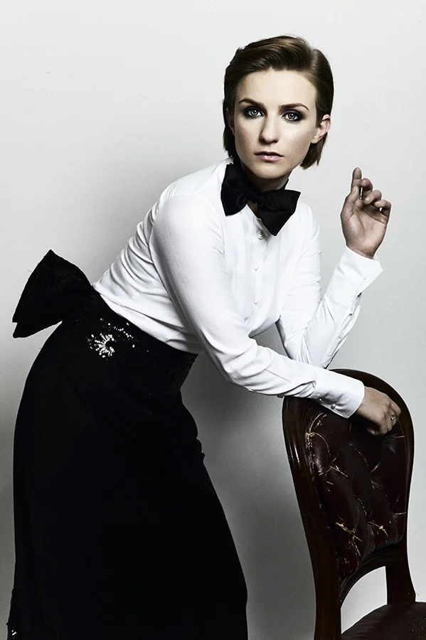 Faye wears skirt and skirt by Lee Patron, bow tie vintage