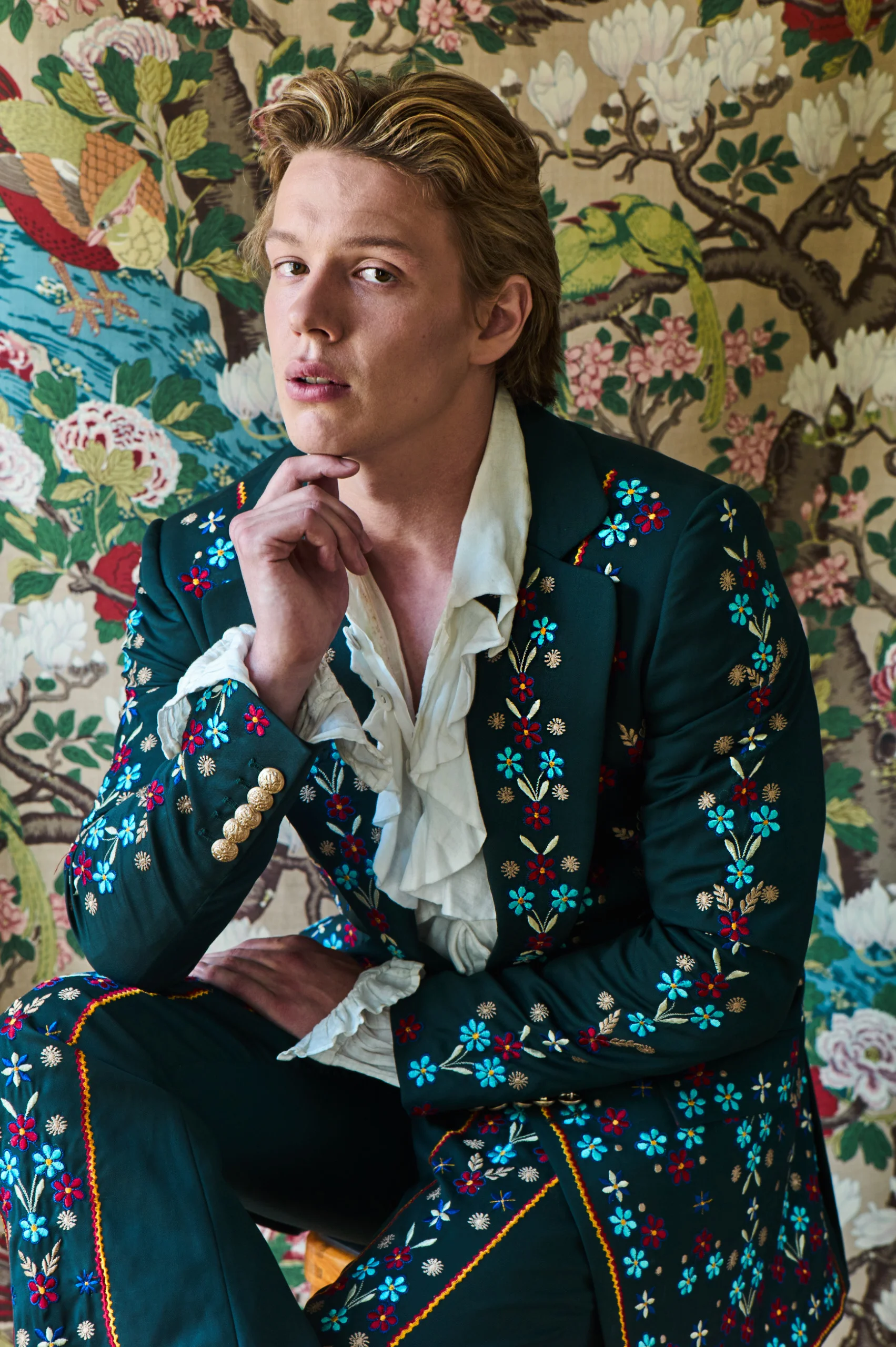 Freddie Wise wearing shirt by Wall & Jones, suit Helen Anthony, set “Rockbird” fabric in multicolour GP & J Baker