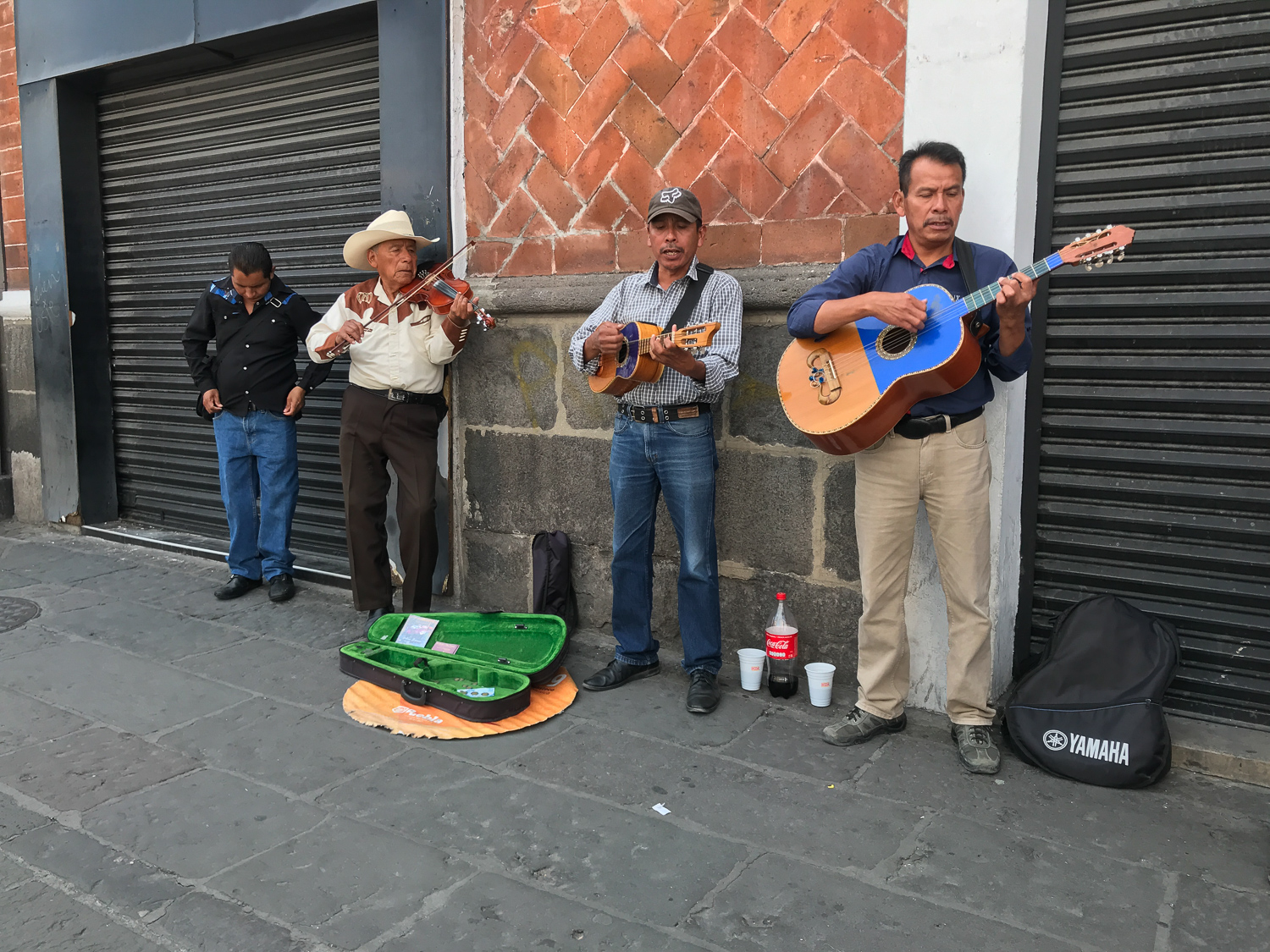  As such was the case with these musicians who would be a rare find in Los Angeles. Rudy and I were having our weekly check-in on a walk in Puebla and came across this trio. The violinist captured my attention! He has a strong resemblance to one of o