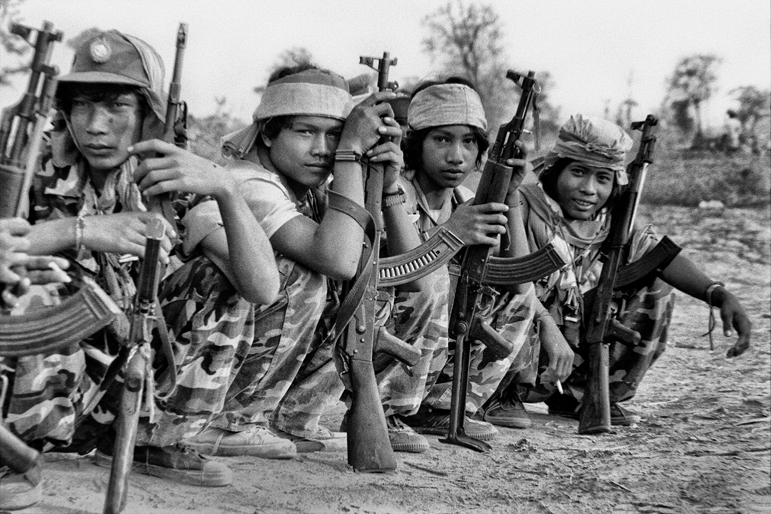 A group of young Khmer Serei anti-communist soldiers in Cambodia with guns circa 1979 Photography Pierre Toutain-Dorbec.jpg