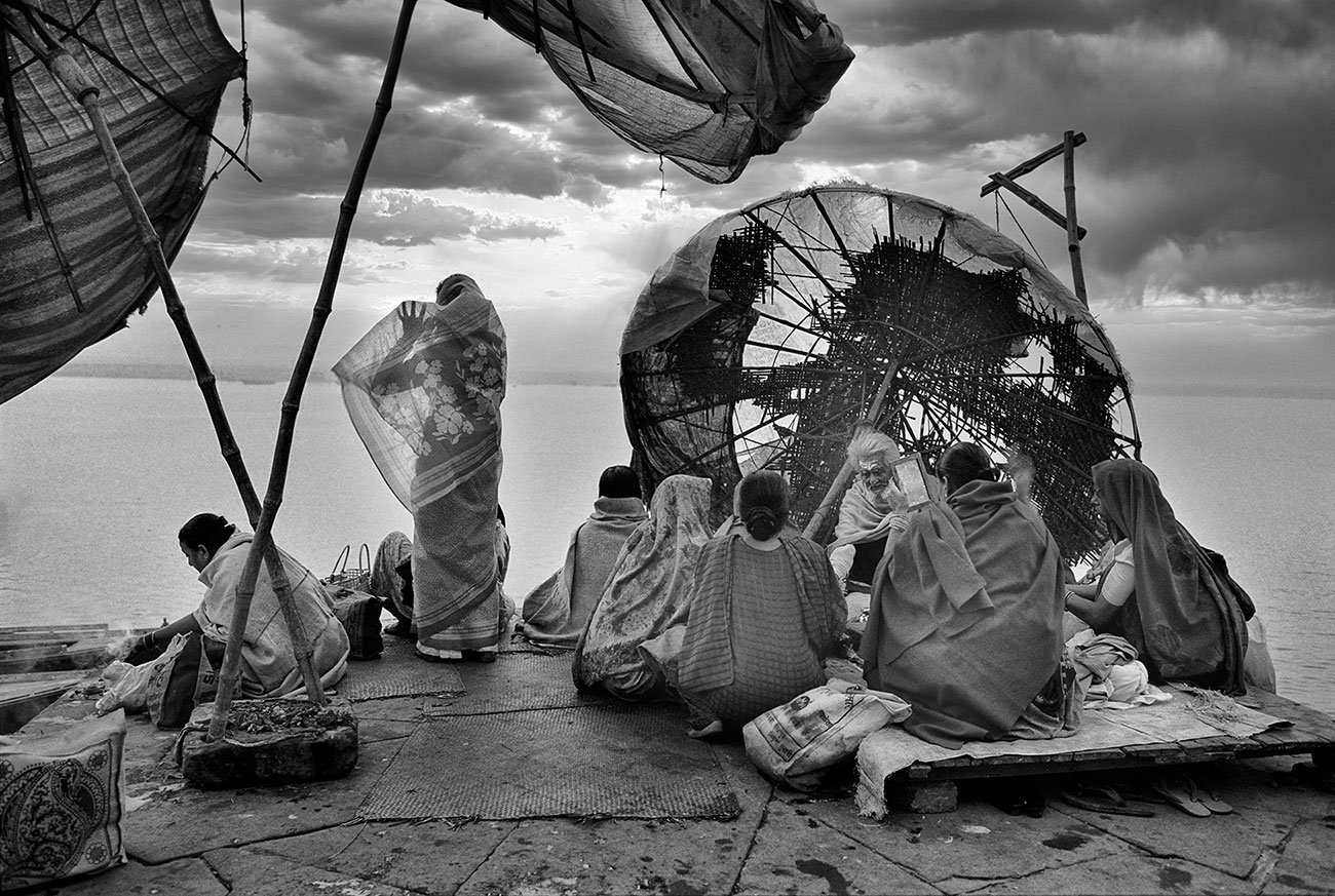 Pilgrims praying along the Ganges River in Varanasi (Benares) the holy Indian city Photography Pierre Toutain-Dorbec.jpg