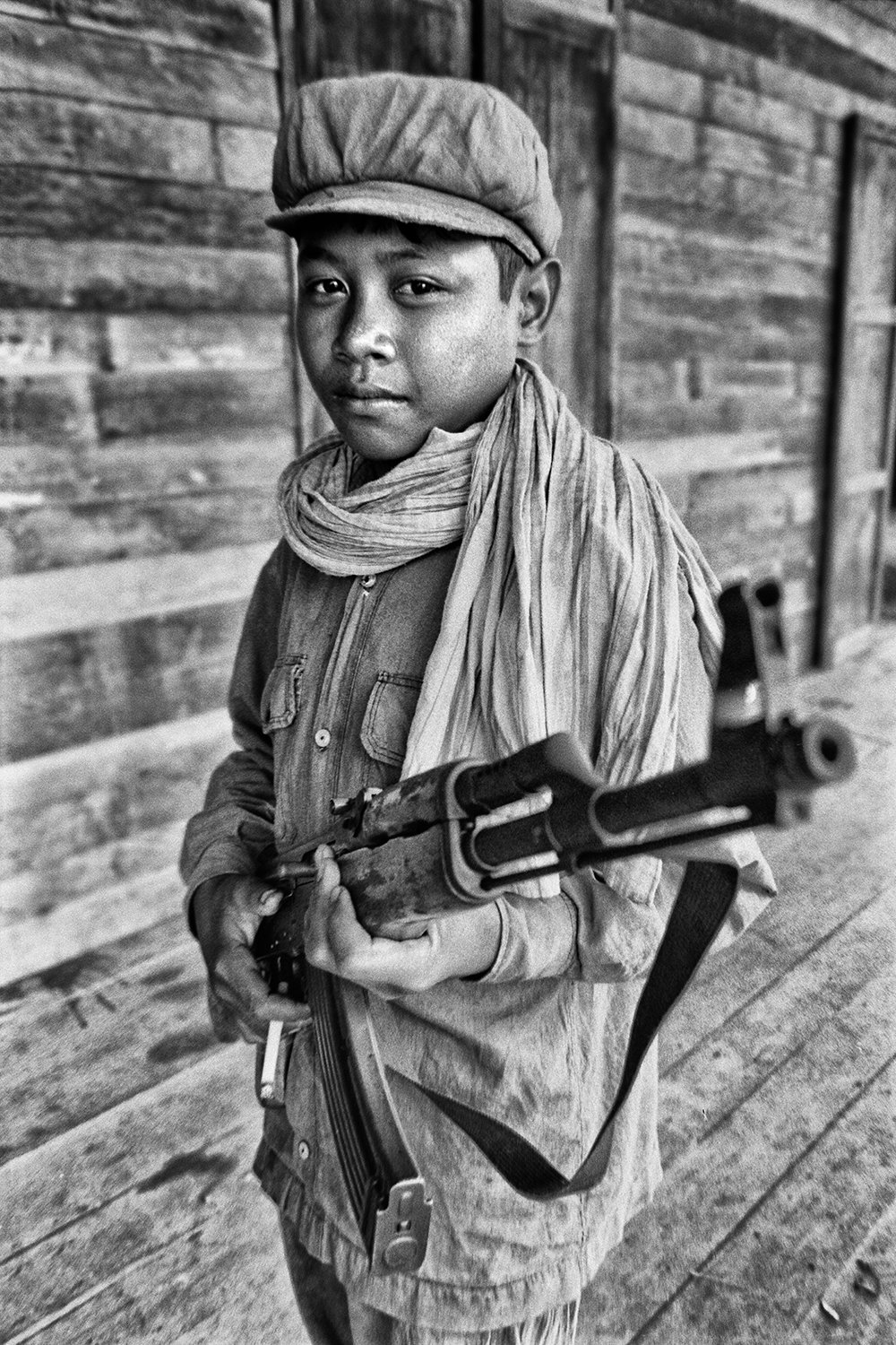 Young Khmer Rouge soldier with AK47 in Cambodia during Pol Pot regime Photography Pierre Toutain-Dorbec.jpg
