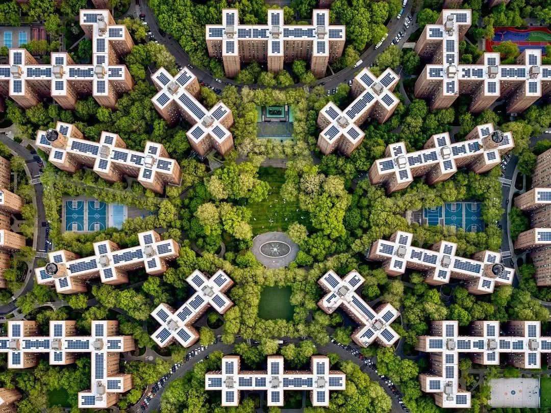 Aerial establishing shot of Stuyvesant Town-Peter Cooper Village on the east side of Manhattan on a sunny evening in summer.