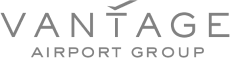 Vantage Airport Group logo in gray text with an airplane icon above the letter T.