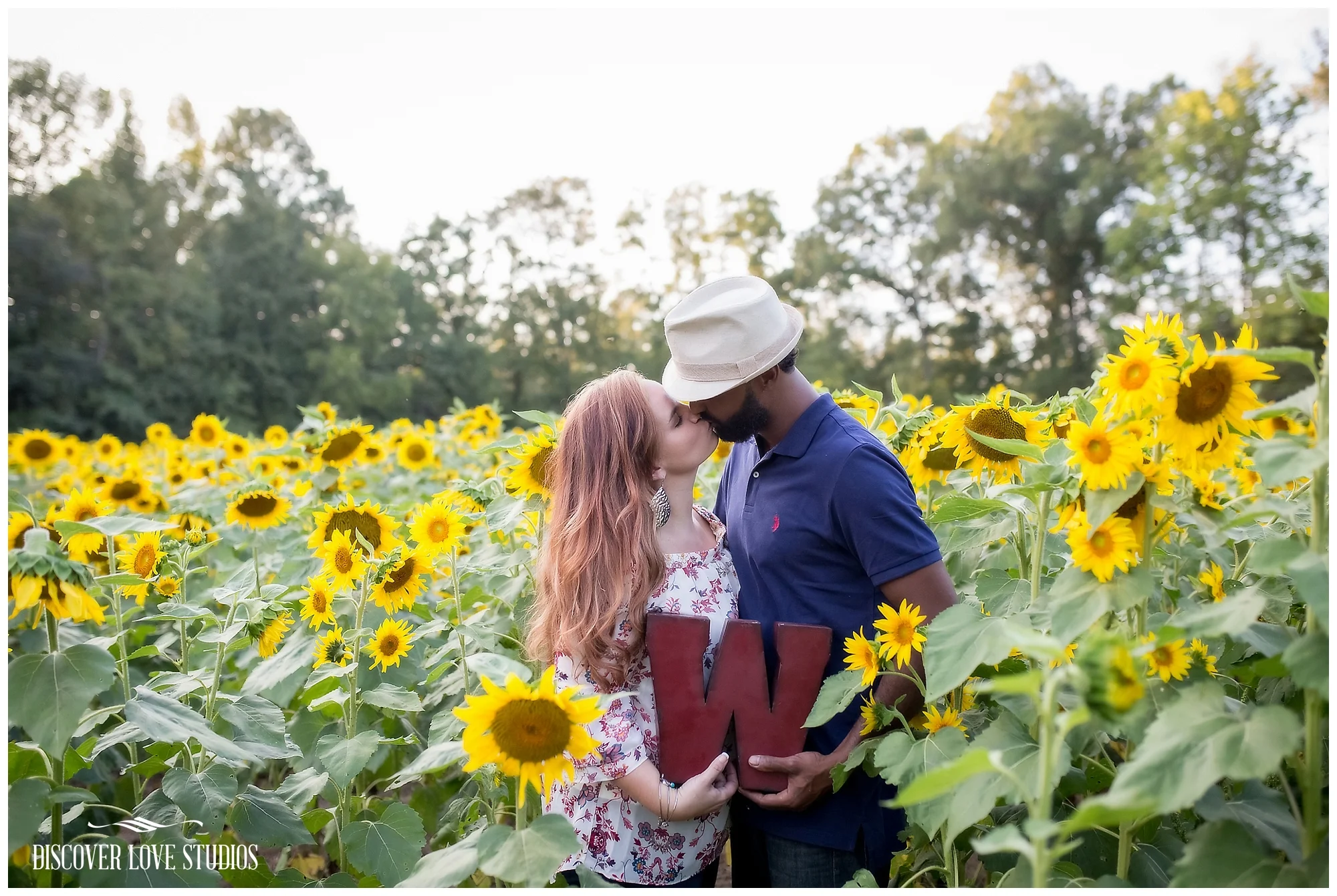 DanaAshfordEngagementSessionSunflowerFieldBushNVineFarmYorkSCDiscoverLoveStudios_0009.jpg