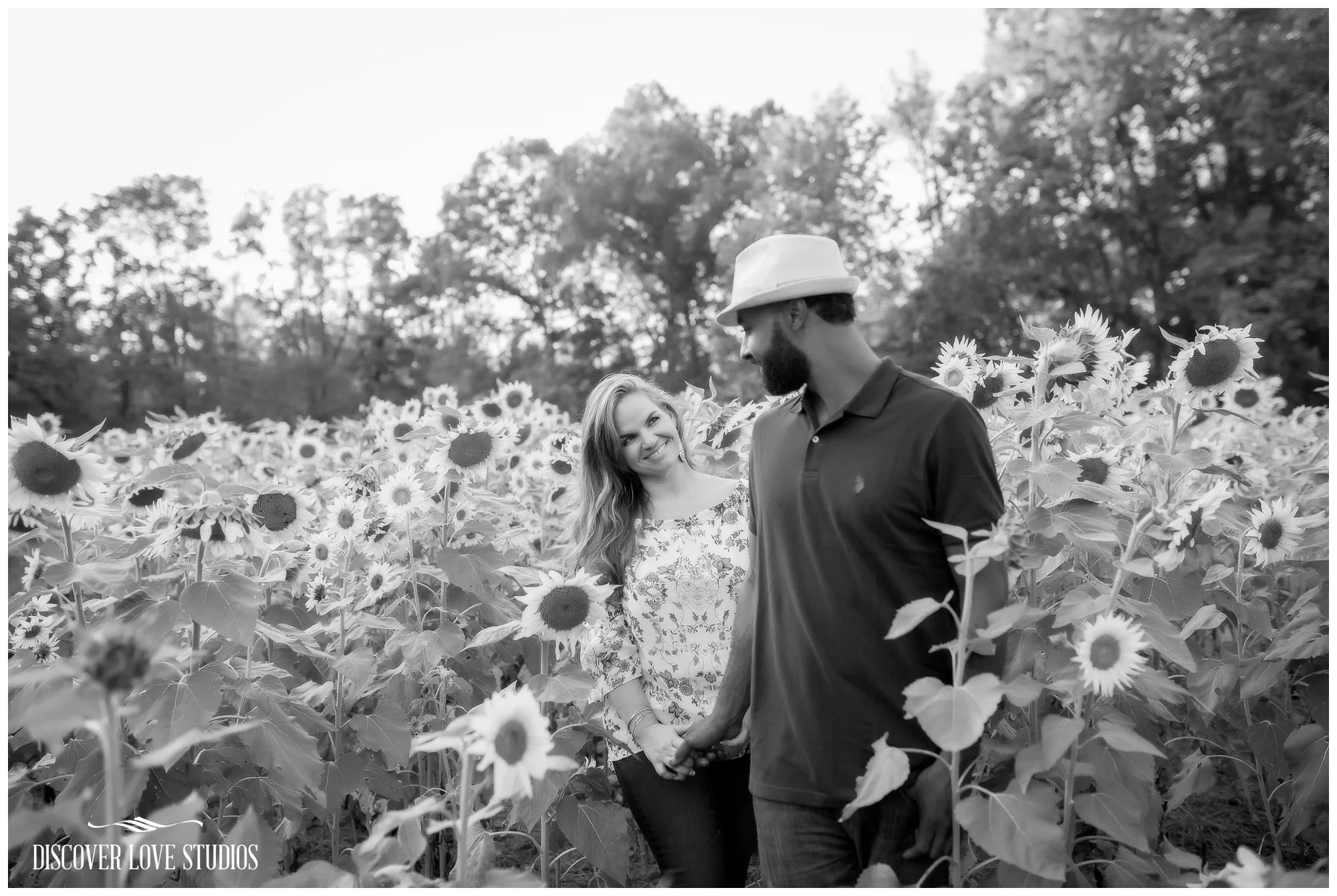 DanaAshfordEngagementSessionSunflowerFieldBushNVineFarmYorkSCDiscoverLoveStudios_0013.jpg