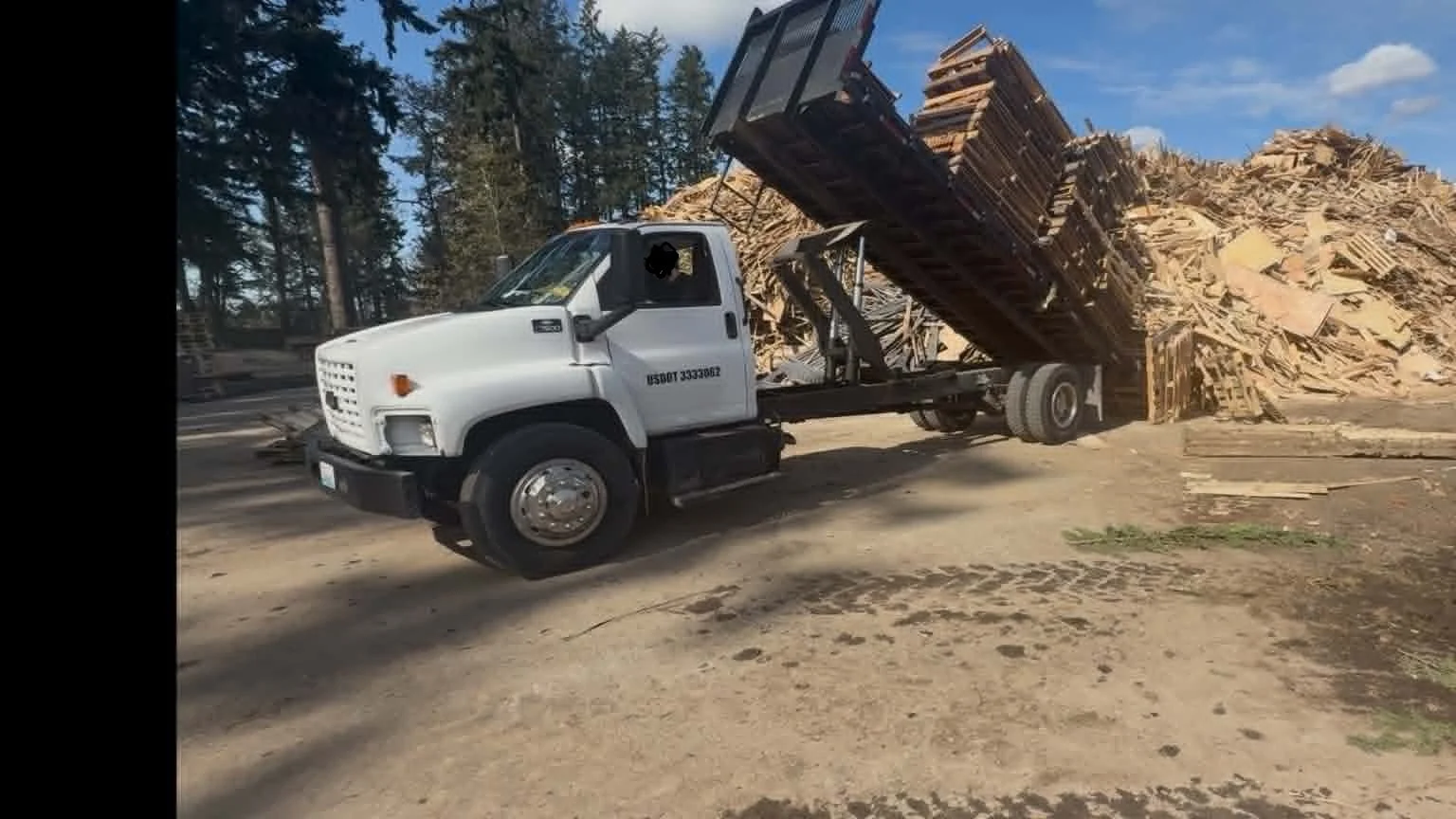 Flatbed Dump Truck Recycling Pallets