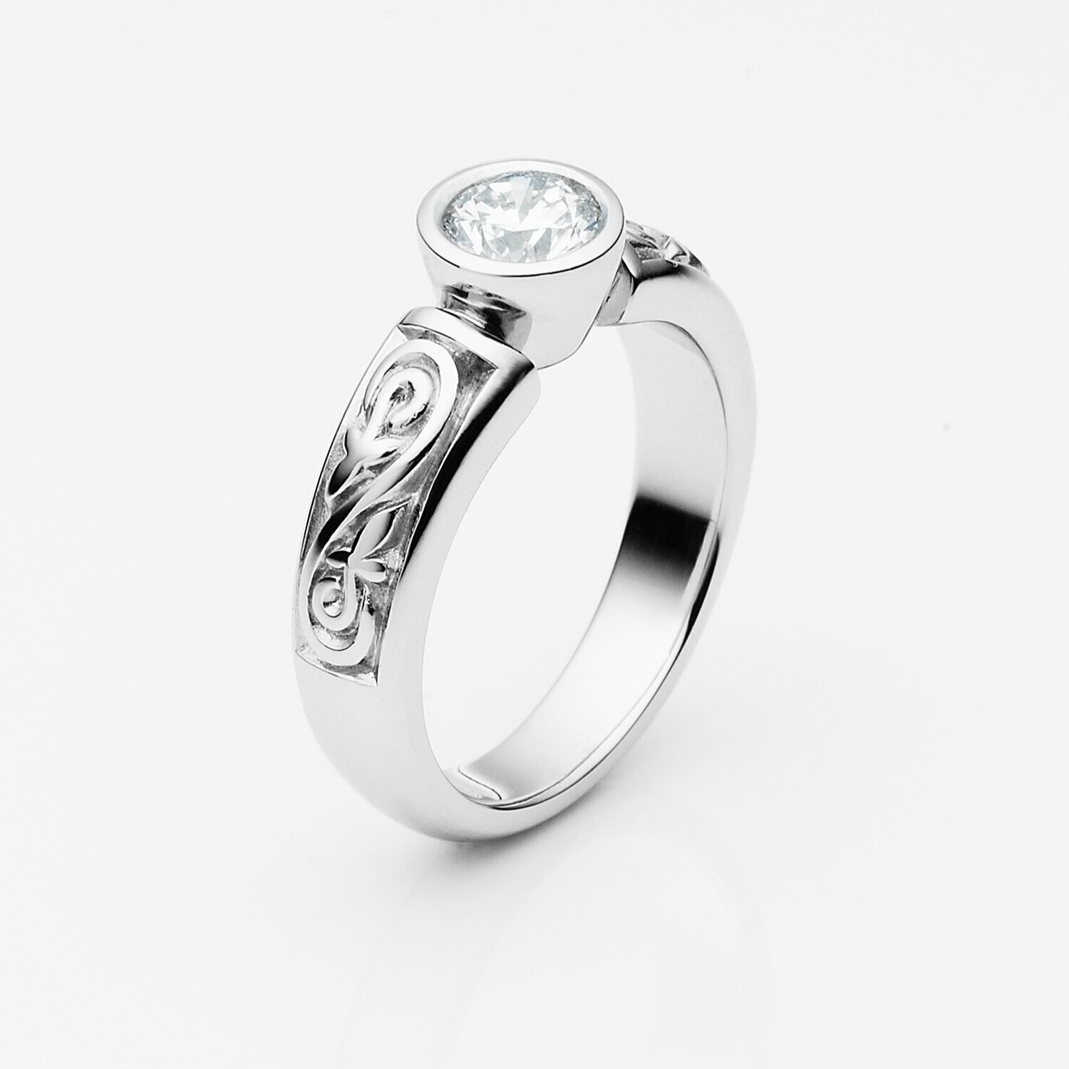 scroll_solitaire_ring_white_gold.jpg