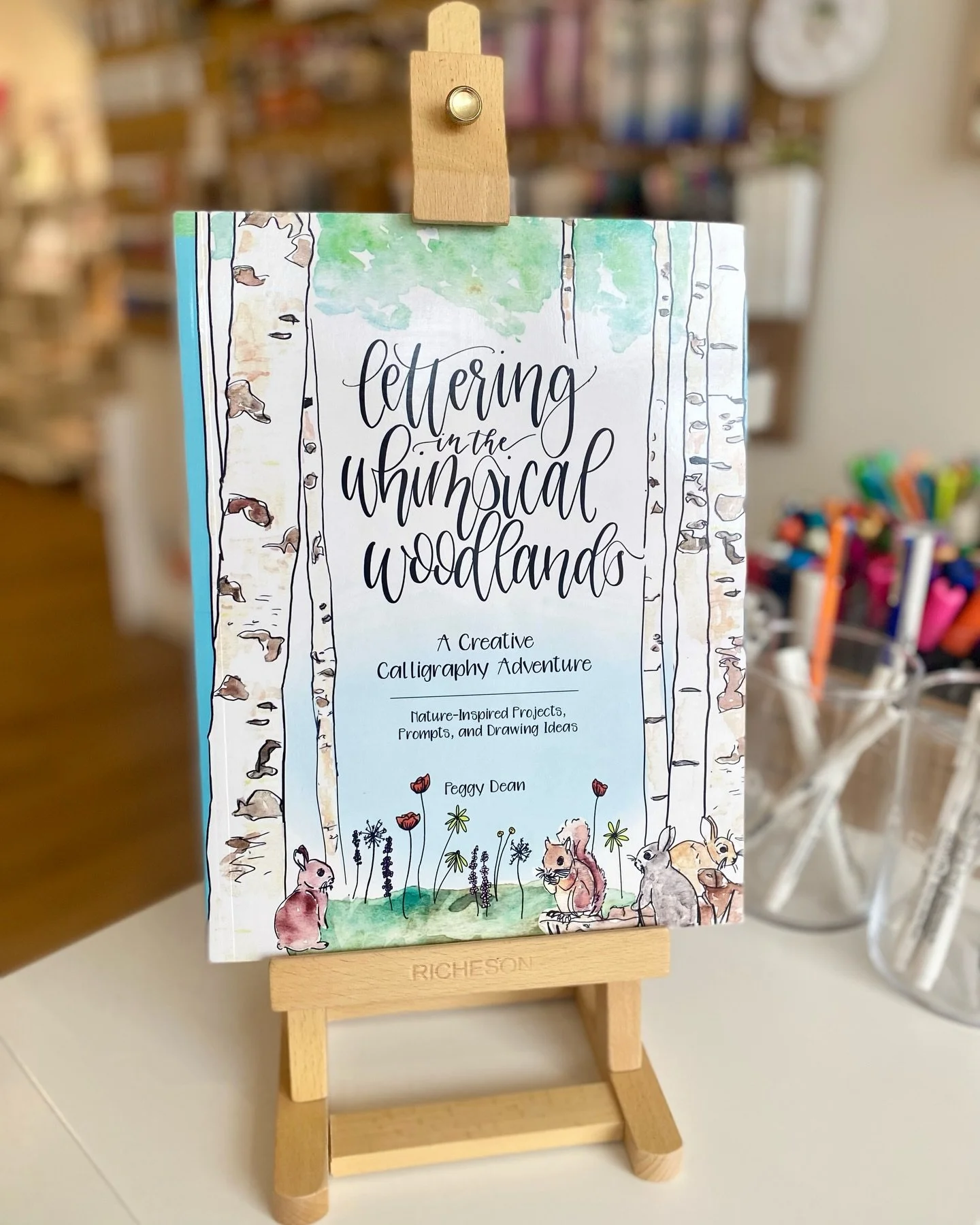 Rainy day reset 🌧️ 
Manifesting spring with Lettering in the Whimsical Woodlands 🌿 ✨

Grab a Zebra Disposable Fountain Pen or our Uchida opaque calligraphy paint markers and let&rsquo;s pretend the flowers are already blooming. Happy Friday everyon