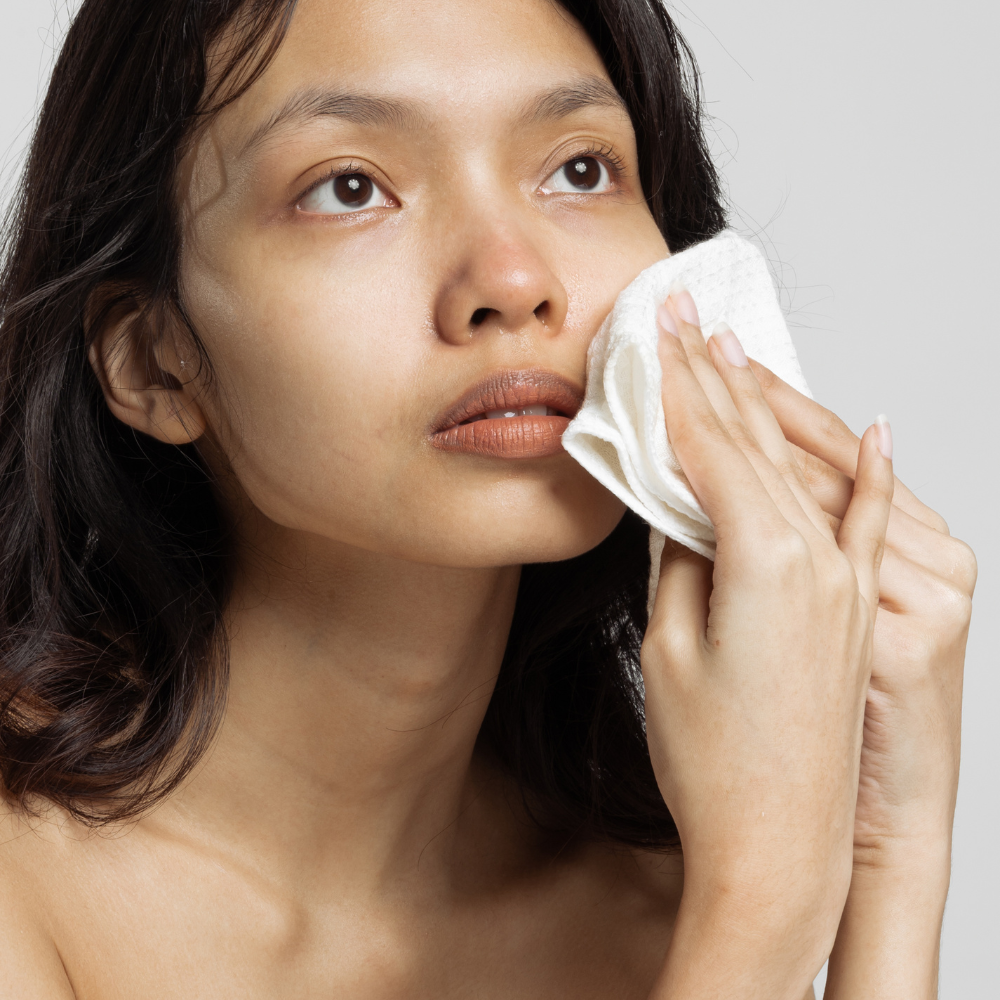 4. Gently pat your face dry with a clean dry towel.