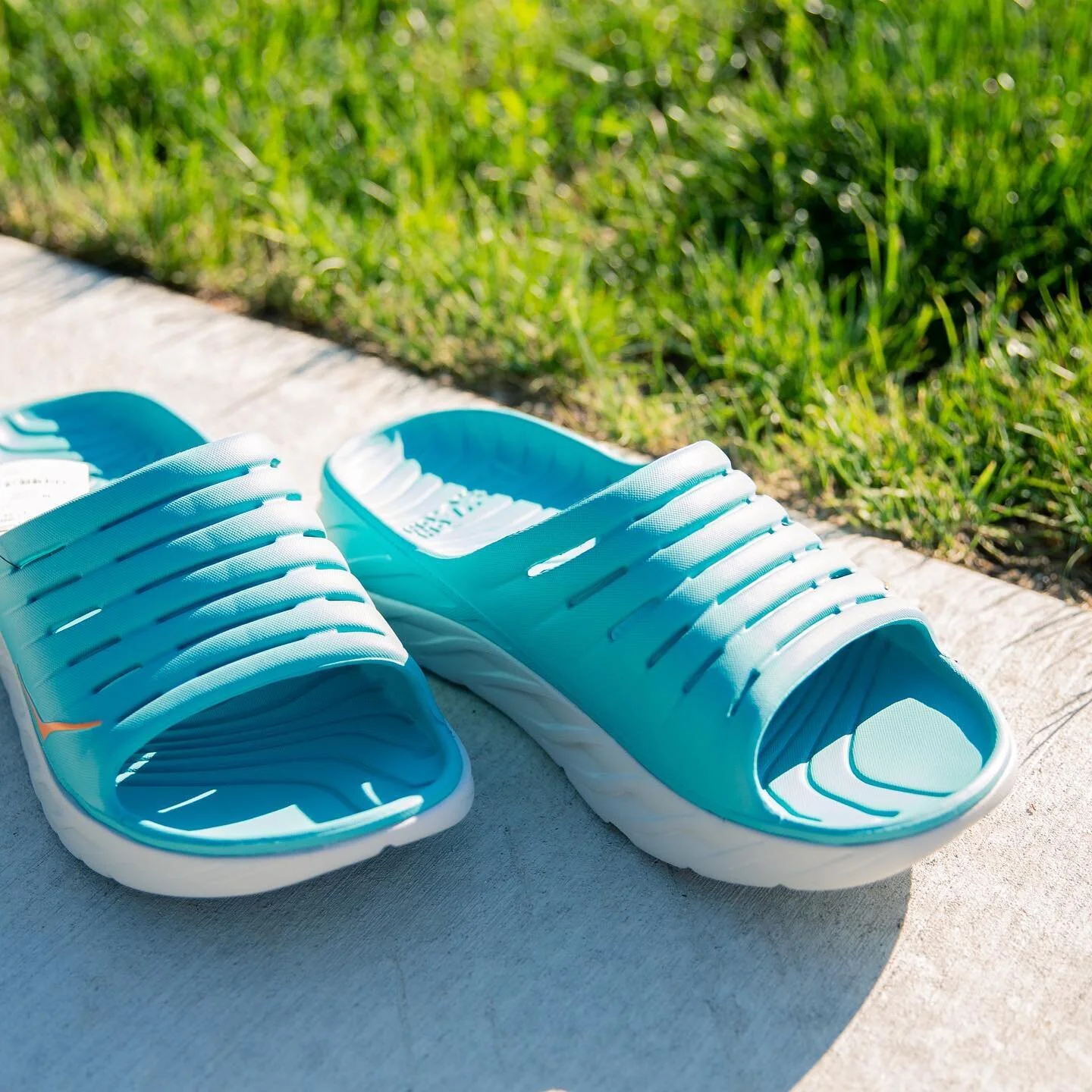 With the holiday weekend right around the corner,what better way to relax after a run or even on your way to the beach than with @hokaoneone recovery slides in the fun summer colors. Stop in and try them out for yourselves