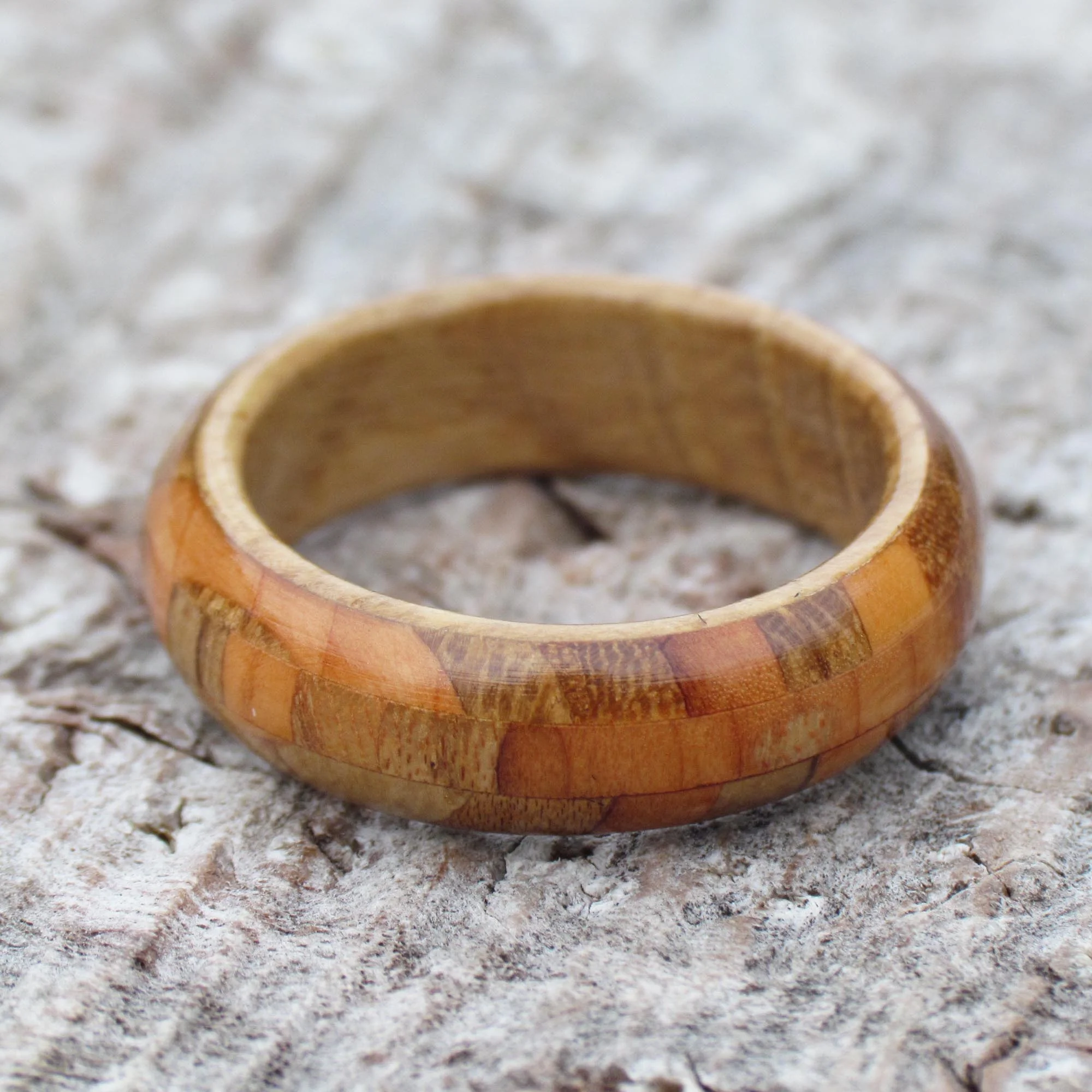 wooden ring made from different scottish trees such as Oak trees, Yew trees and Elm trees