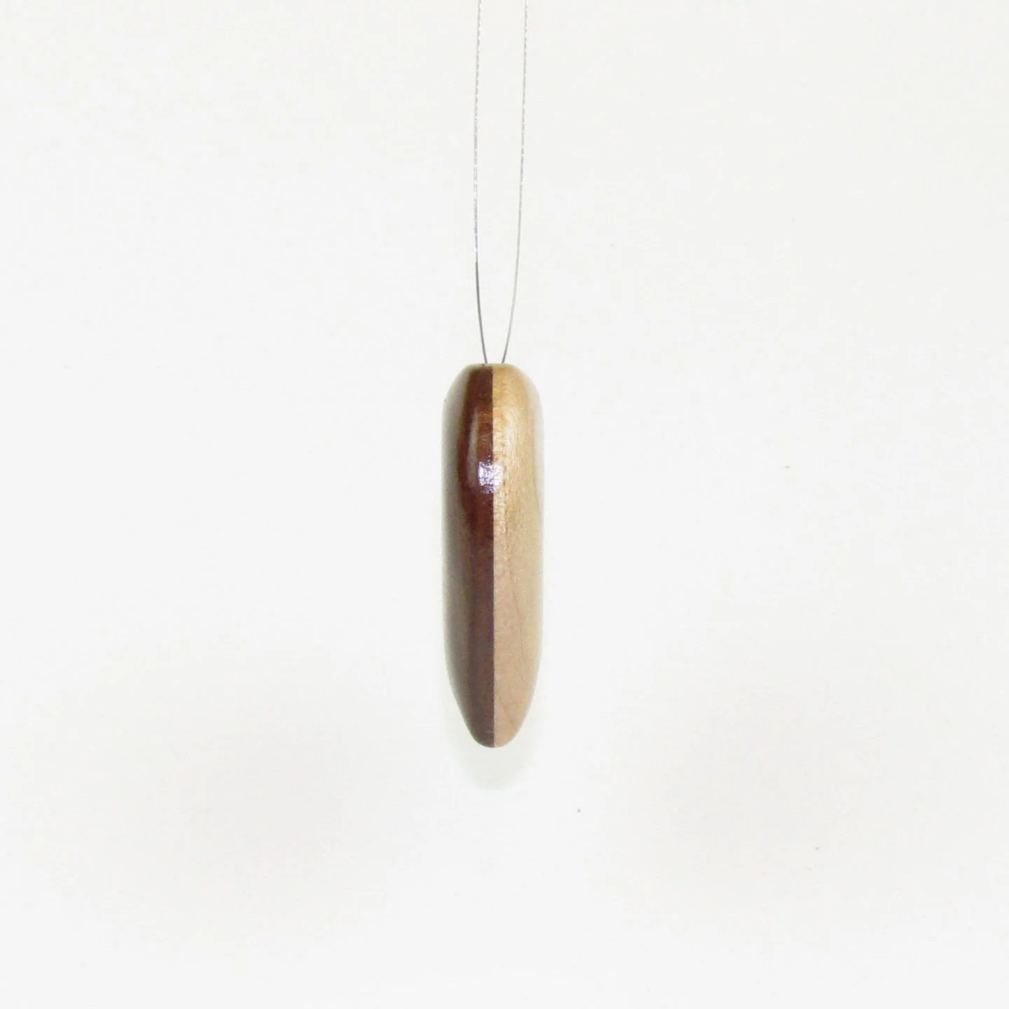 Rose wood and maple wood heart pendant