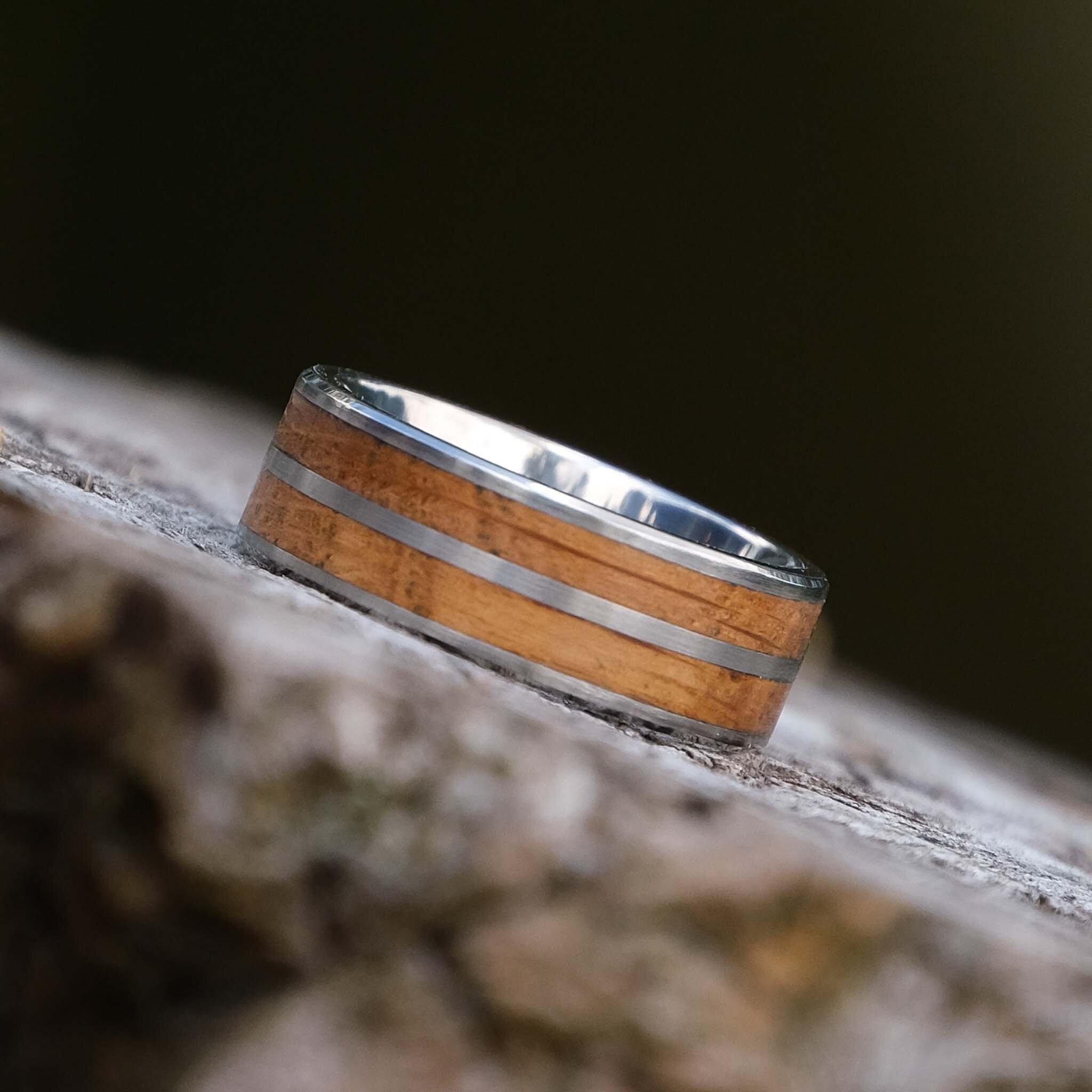 Titanium ring with channels of reclaimed whisky barrel oak