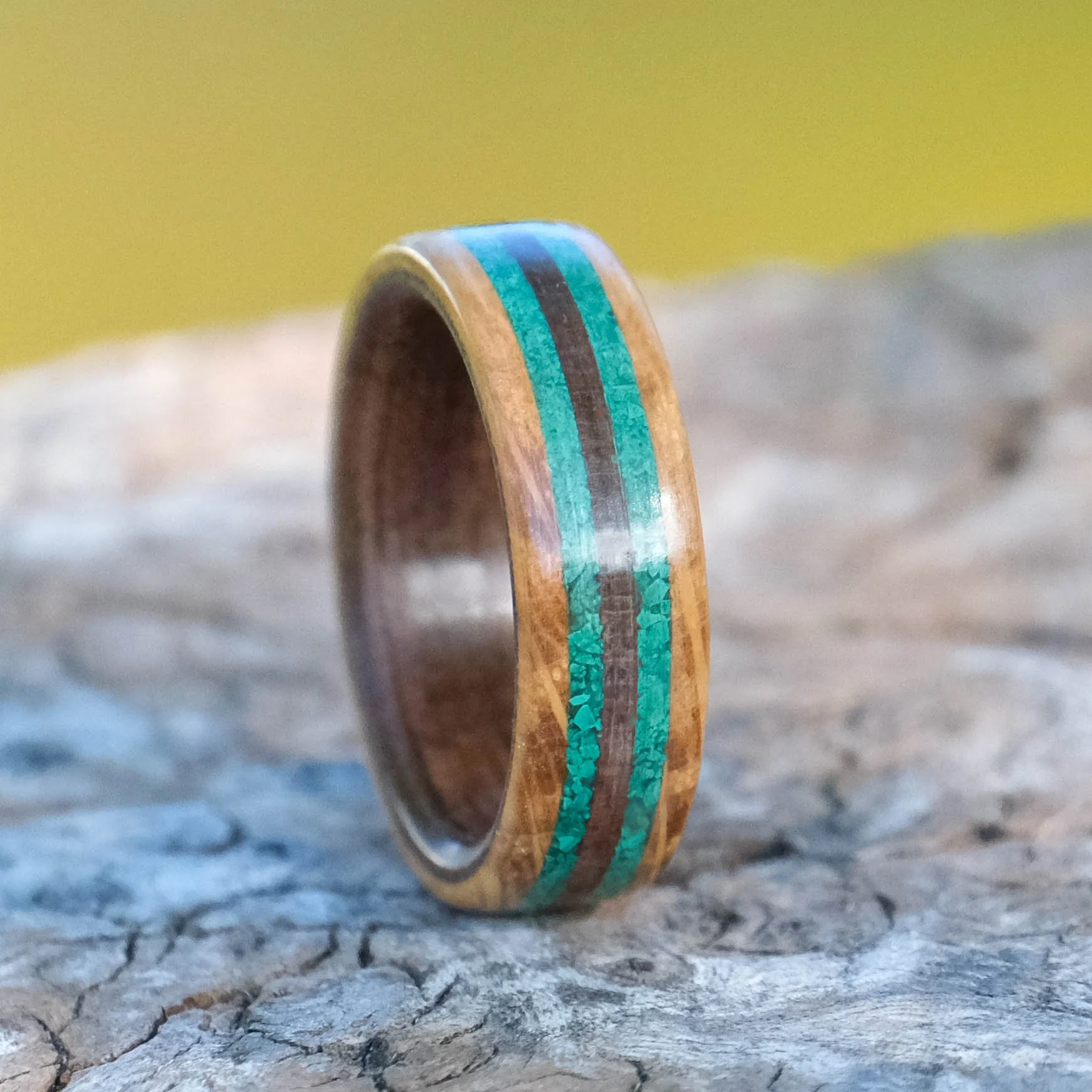Wooden commitment ring made from oak and walnut inlaid with malachite